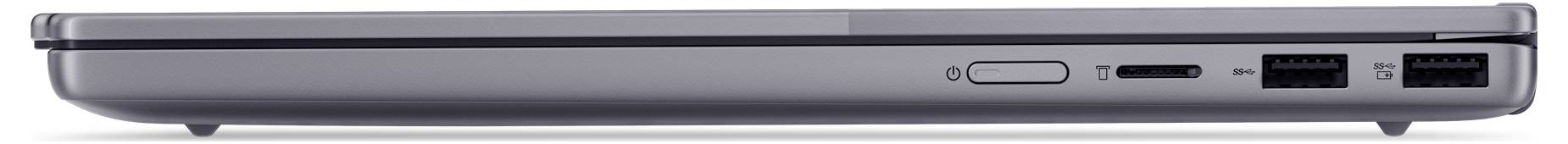 Seitenansicht der linken Kante eines Laptops, die einen Ladeanschluss, eine Audiobuchse und zwei USB-Anschlüsse zeigt.