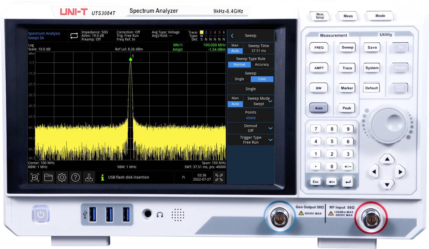 UNI-T Spektrumanalysator, der ein gelbes Frequenzspektrum mit einem starken zentralen Peak und einem niedrigen Rauschfloor auf einem Benchtop-Instrument mit Steuertasten und Display zeigt.