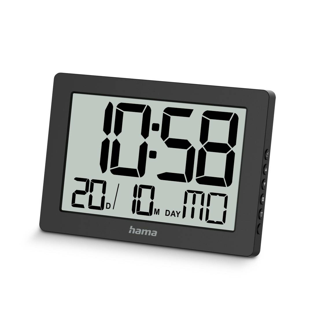 Digitale Tischuhr, die 10:58 anzeigt, mit Datum 20/10 und Tag MO in einem schwarzen Hama-Rahmen.