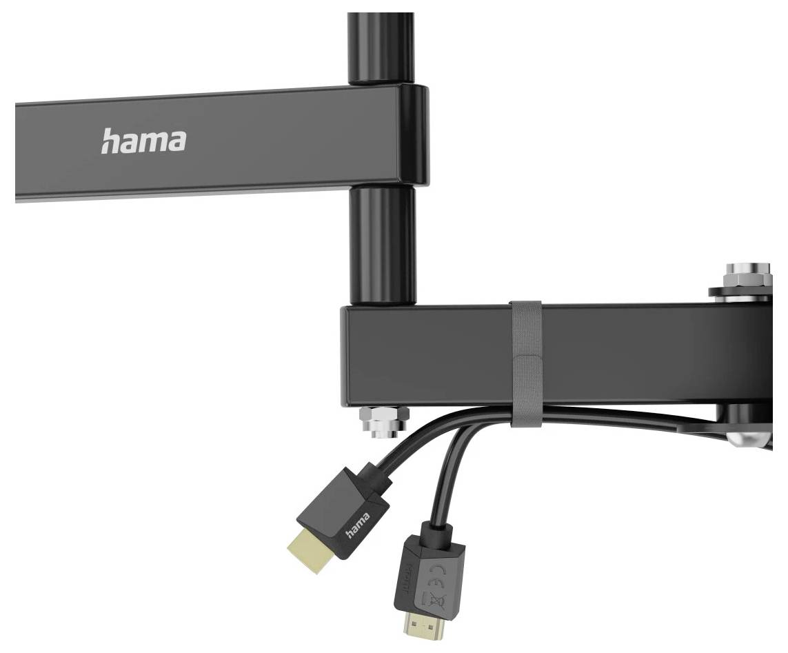 Nahaufnahme eines schwarzen Hama-Monitorarms mit zwei hängenden Kabeln und HDMI-ähnlichen Steckverbindern, die an der Halterung befestigt sind.