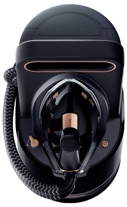 Draufsicht auf eine schwarze und kupferfarbene Vollgesichts-Schnorchel-Maske mit Schlauch und durchsichtiger Gesichtsdichtung.
