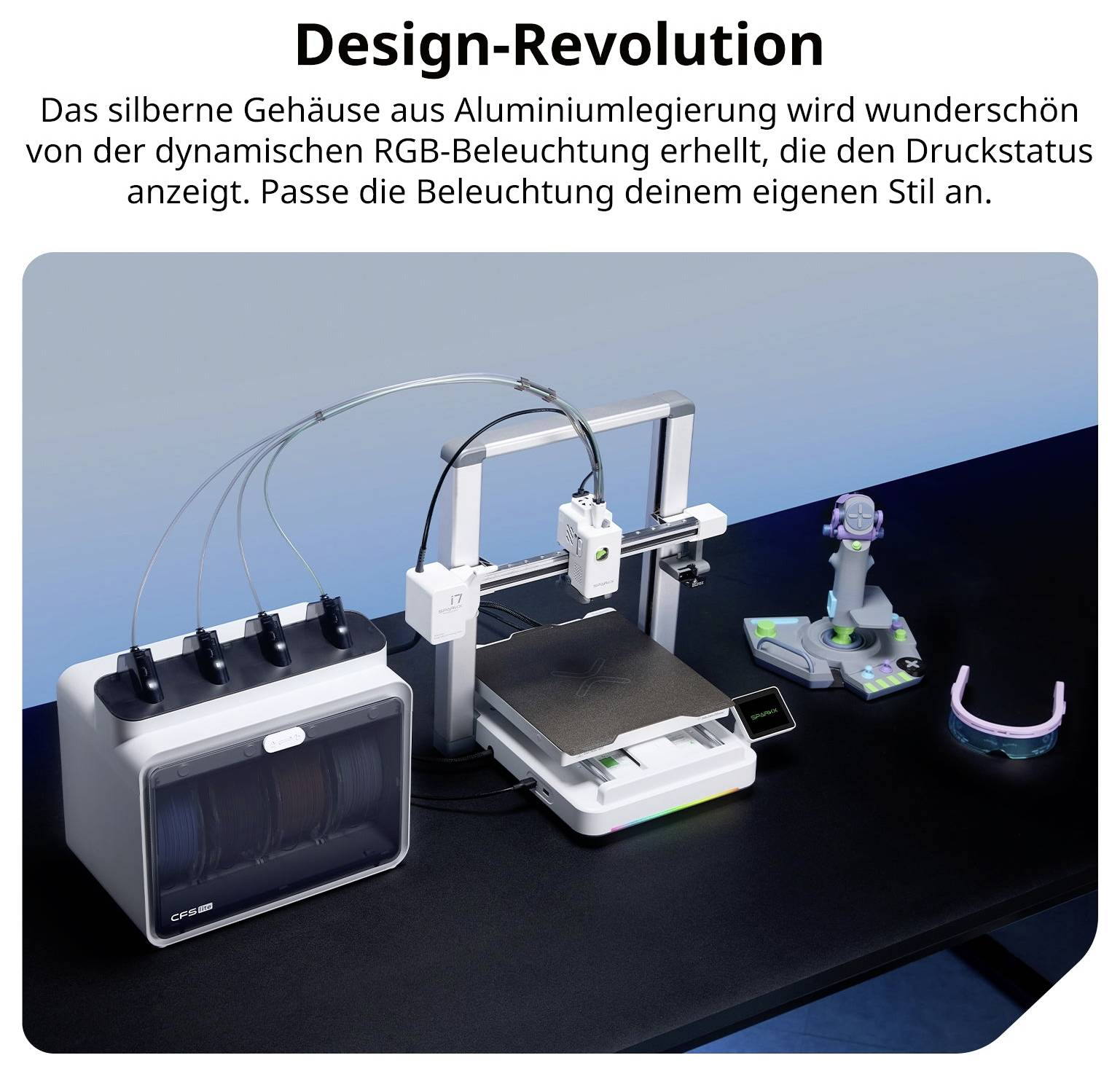 3D-Drucker-Set mit silbernem Gehäuse und RGB-Beleuchtung; Text nennt Druckstatus-Anzeige und anpassbare Beleuchtung.