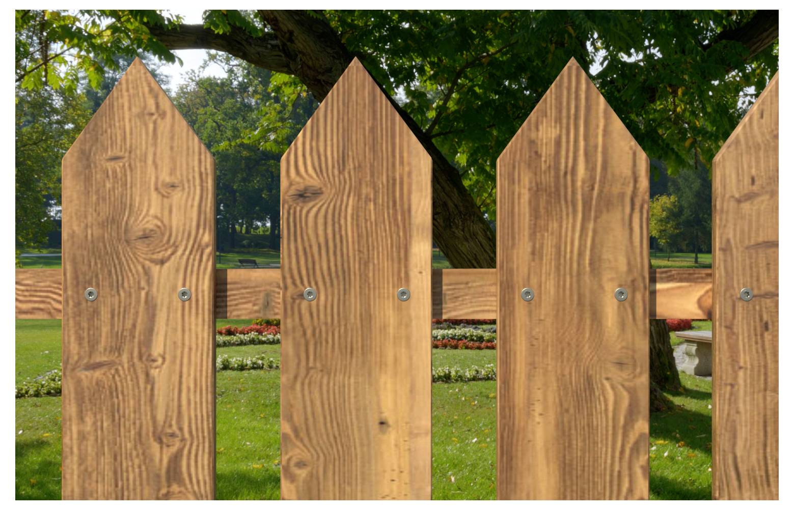 Holzlatten-Zaunfelder mit spitzen Enden in einem Park, mit Bäumen, Gras und Blumenbeeten im Hintergrund.