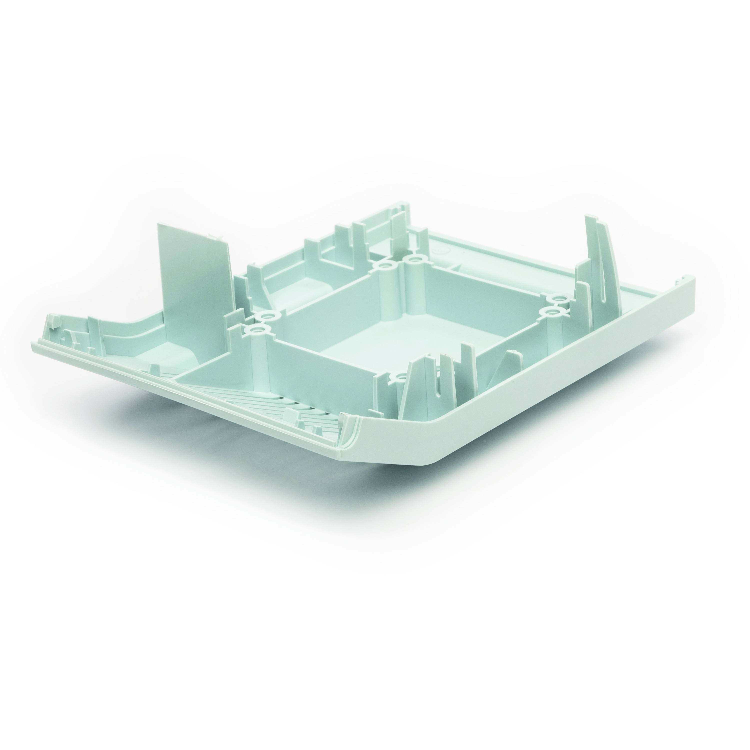 Light mint-green plastic housing tray with internal support posts and cutouts, shown isolated on a white background