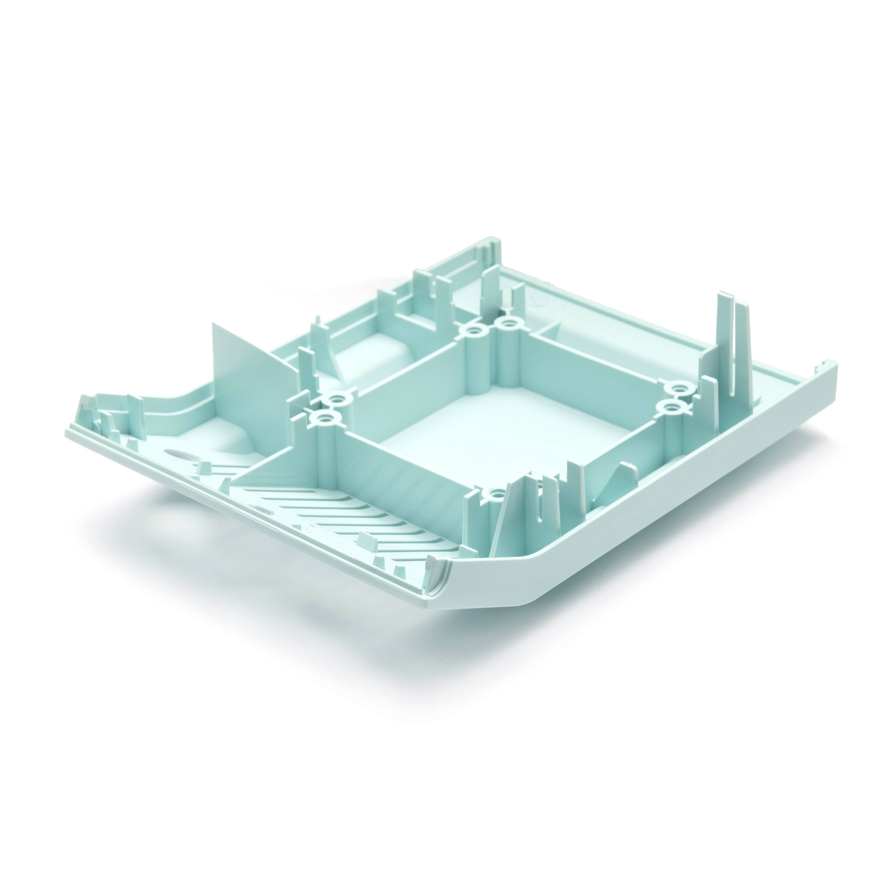 3D render of a mint-green plastic tray or housing frame with raised edges, mounting posts, and cutouts on a white background.
