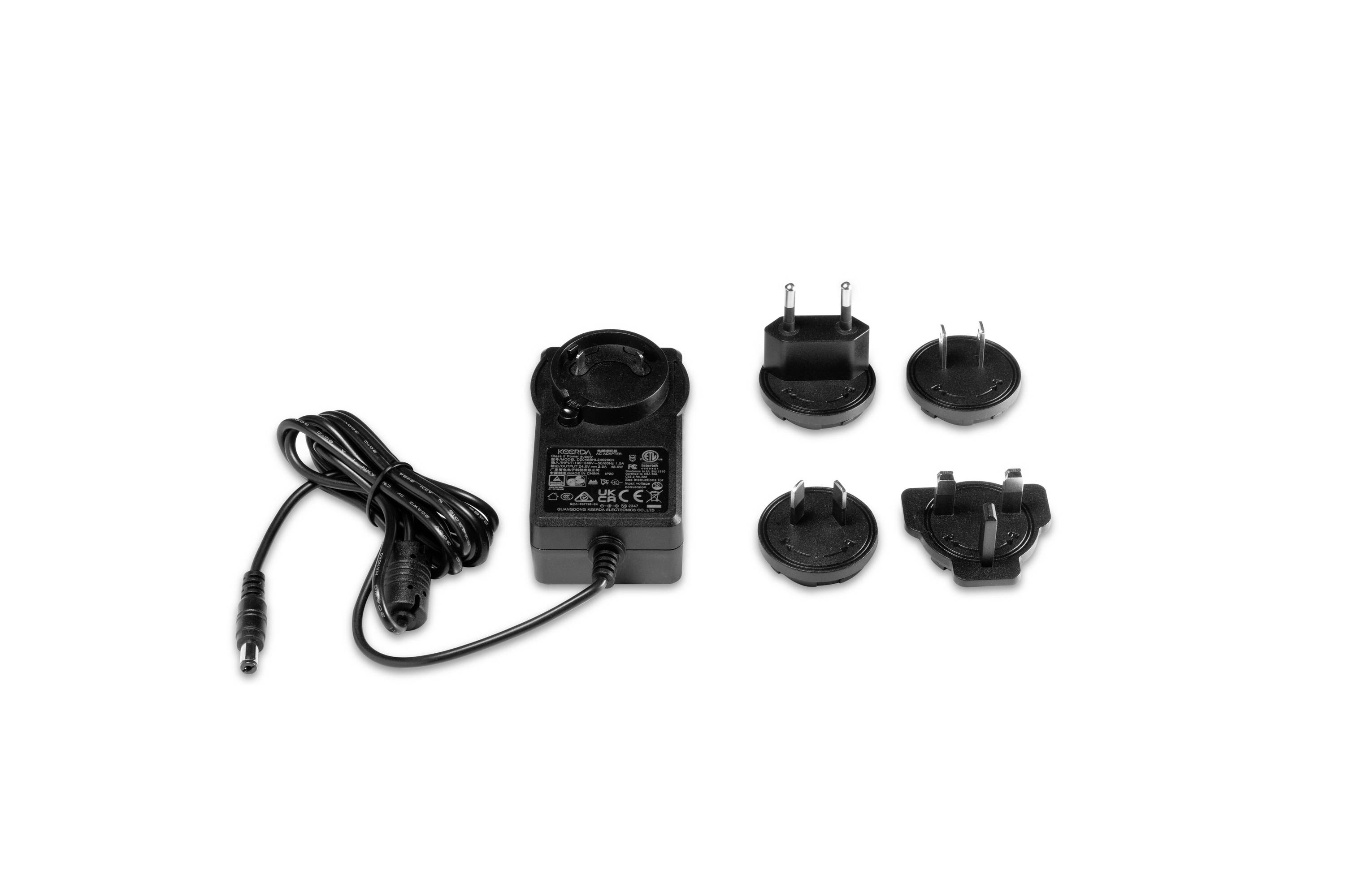 Black AC power adapter with cord and four interchangeable plug adapters on a white background.