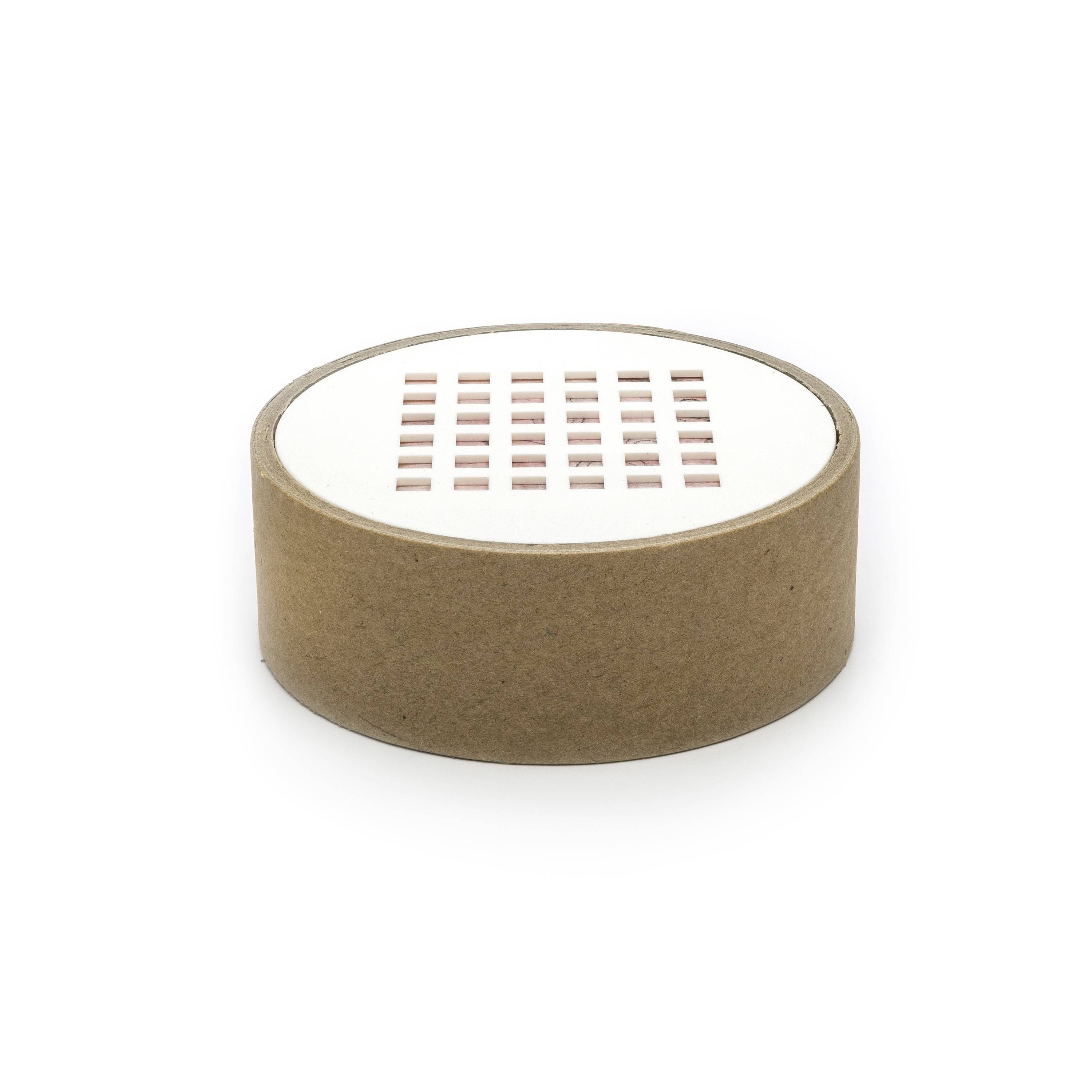 Round brown cardboard box with a white lid featuring a grid of small rectangular slots on a plain white background.