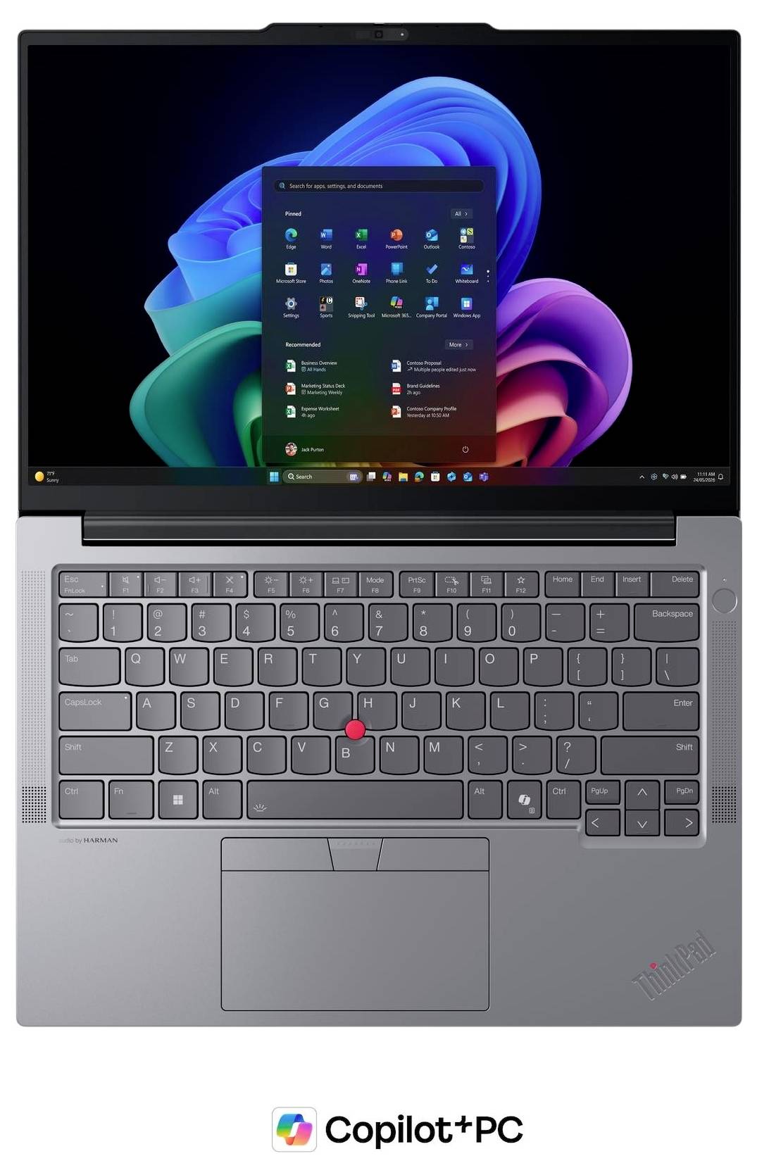 Draufsicht auf einen silbernen Lenovo ThinkPad-Laptop mit dem Windows 11-Desktop und dem Startmenü mit einem „Copilot+ PC