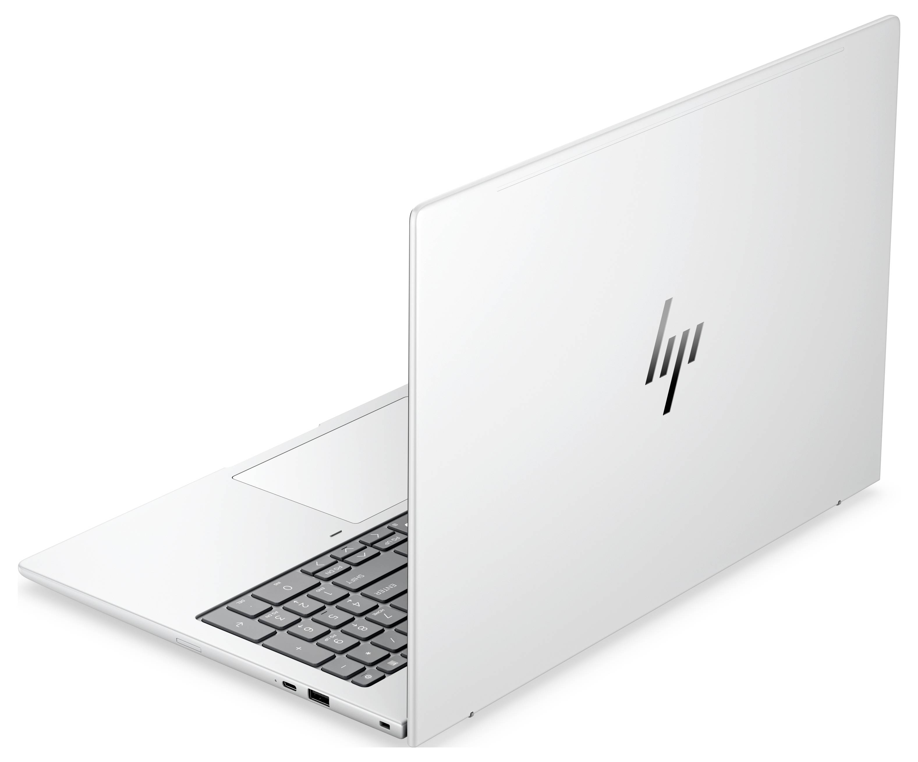 Offener silberner HP-Laptop aus der hinteren Ecke betrachtet, zeigt das HP-Logo und einen Teil der Tastatur.