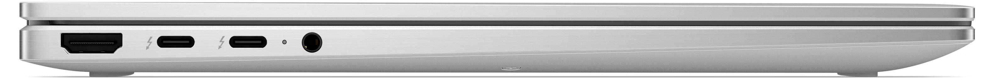 Seitenansicht eines geschlossenen silbernen Laptops mit der Vorderkante, Anschlüssen und einem schwarzen Schlitz.