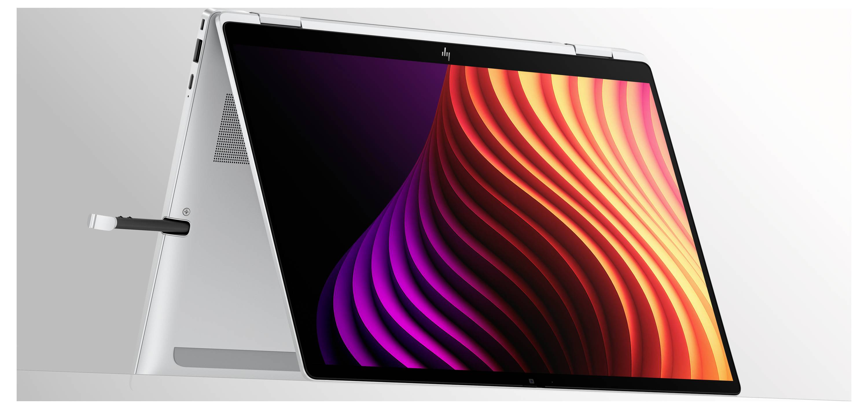 2-in-1-Laptop-Tablet im Zeltmodus mit Stylus, zeigt eine farbenfrohe abstrakte Wellentapete auf dem Bildschirm