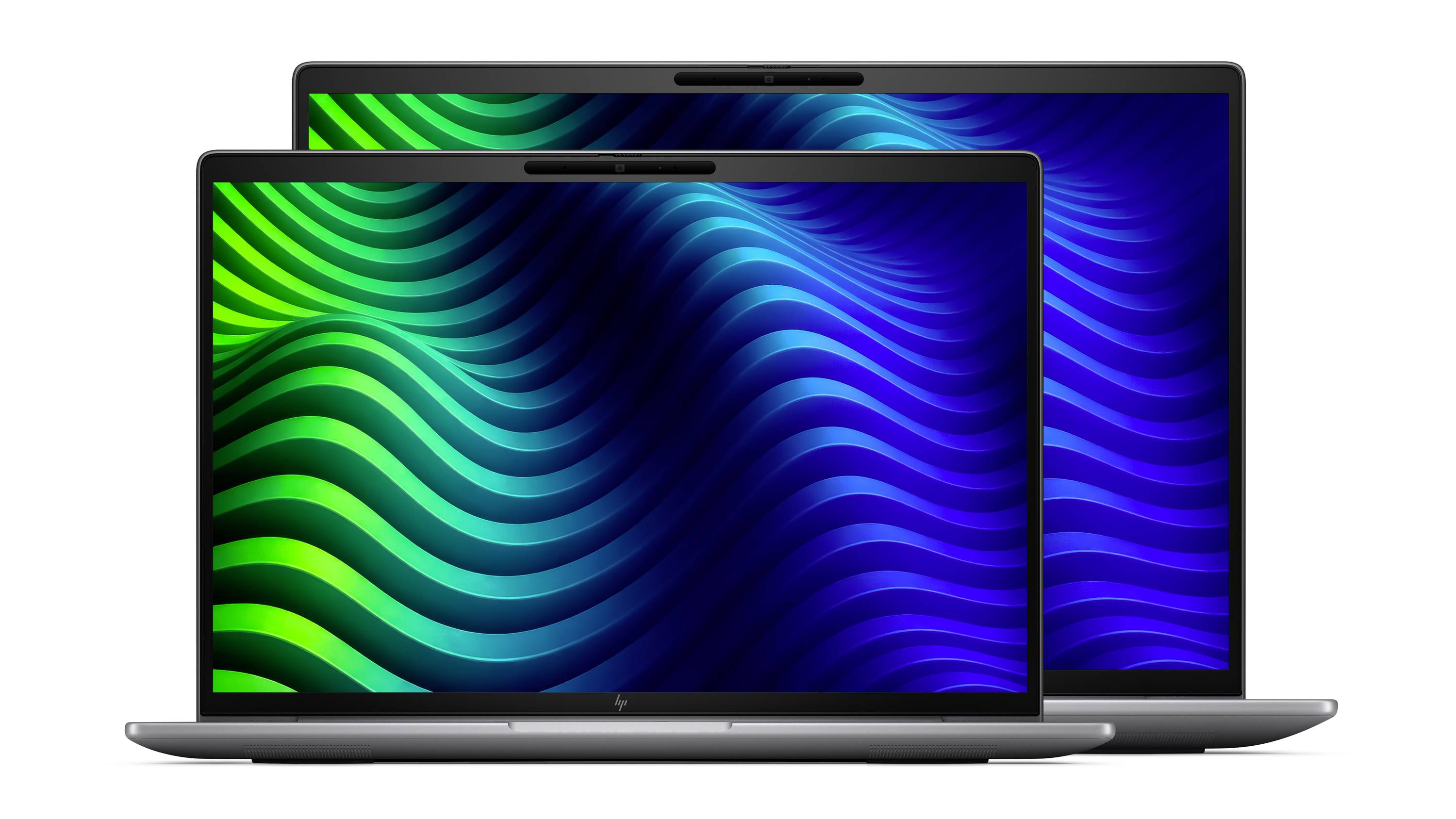 Zwei offene Laptops, einer vor dem anderen, jeder zeigt einen blauen und grünen wellenförmigen abstrakten Bildschirm.