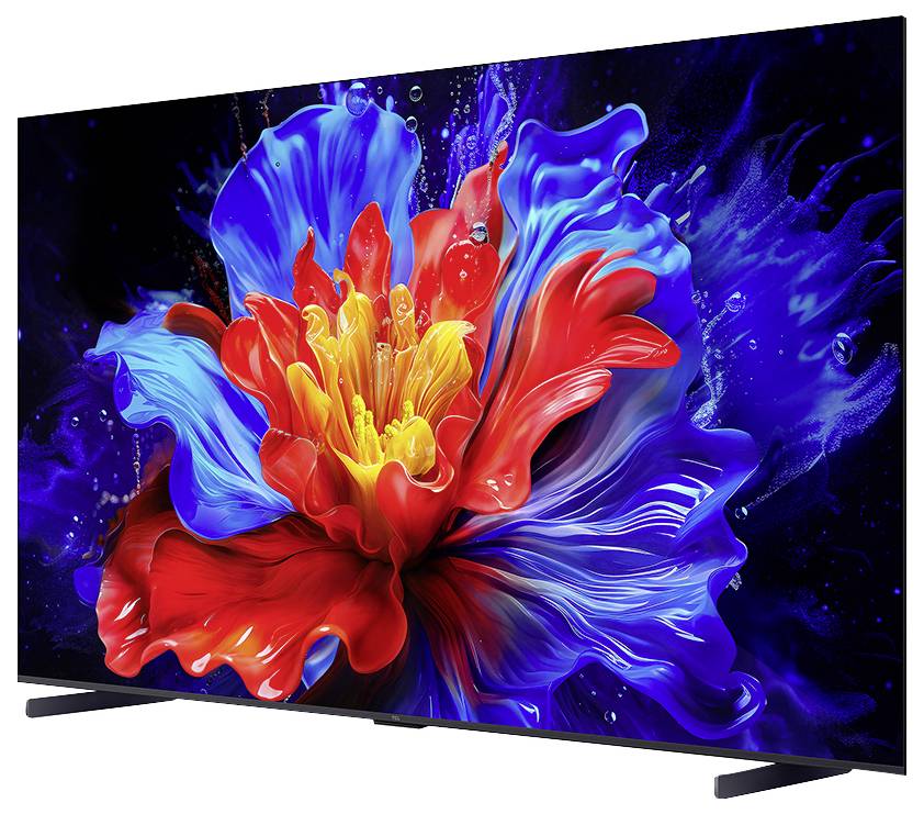 Flachbildfernseher zeigt eine lebendige abstrakte Blume in Rot, Blau und Gelb auf dunklem Hintergrund.