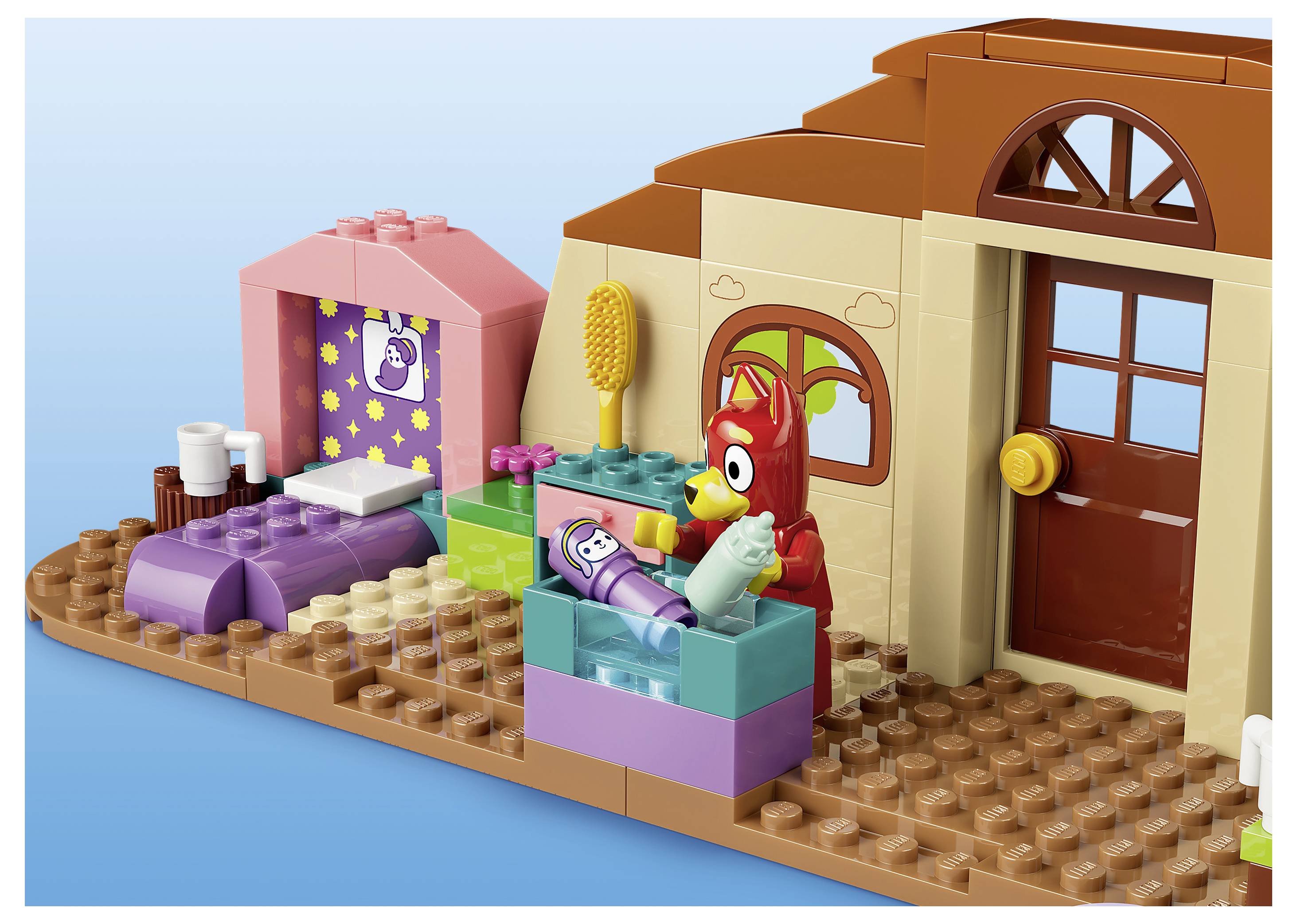 LEGO Friends tragbares Spielset in einem Koffer mit zwei ausklappbaren Räumen und enthaltenen Mini-Puppen-Zubehörteilen, mit Produktbildern auf der Schachtel.