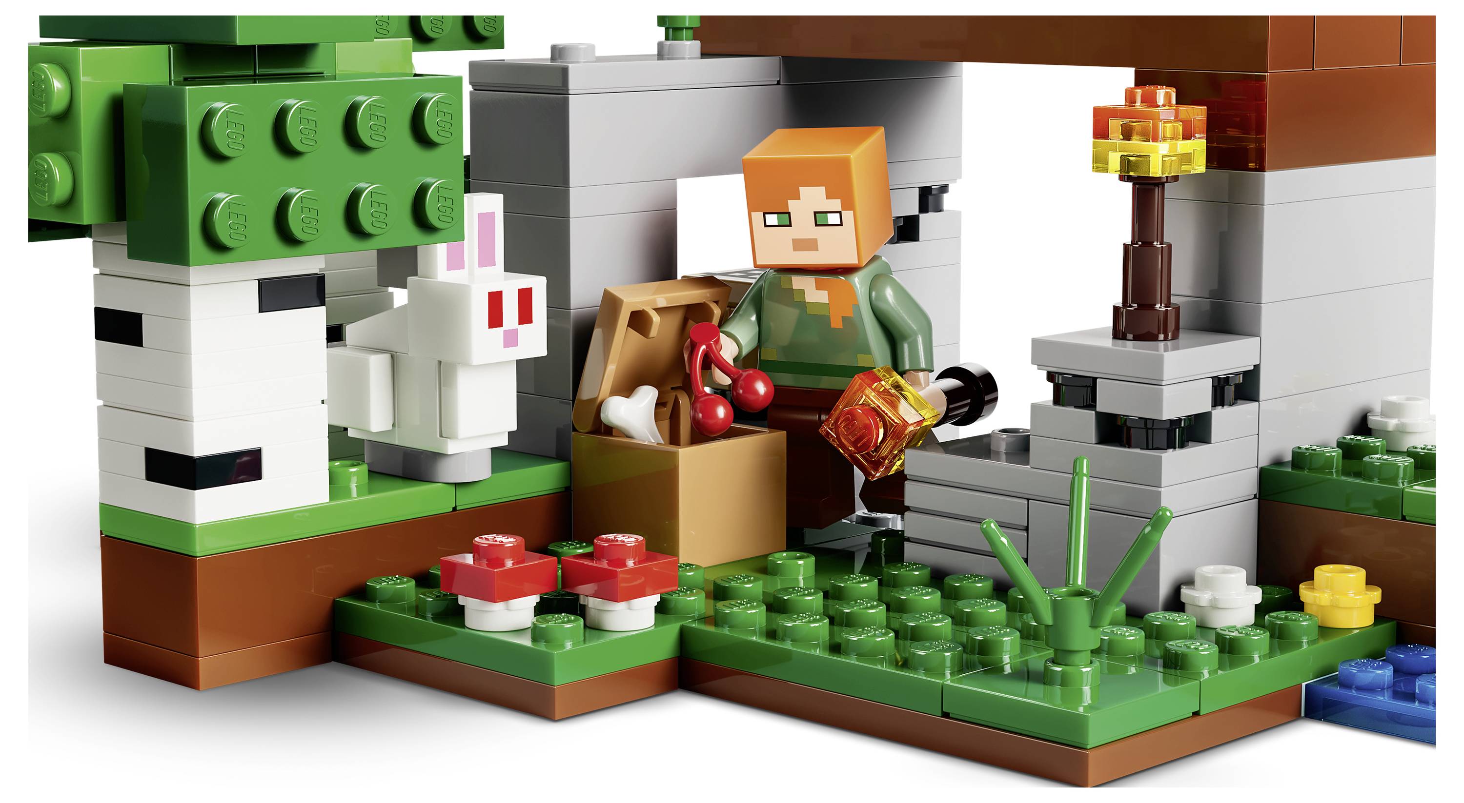 LEGO-ähnliches Puppenhaus-Spielset mit zwei Minipuppen und einer schwarzen Katze, zeigt die Hausfassade, das Innere mit Schlafzimmer/Küche und ein Katzenplakat.