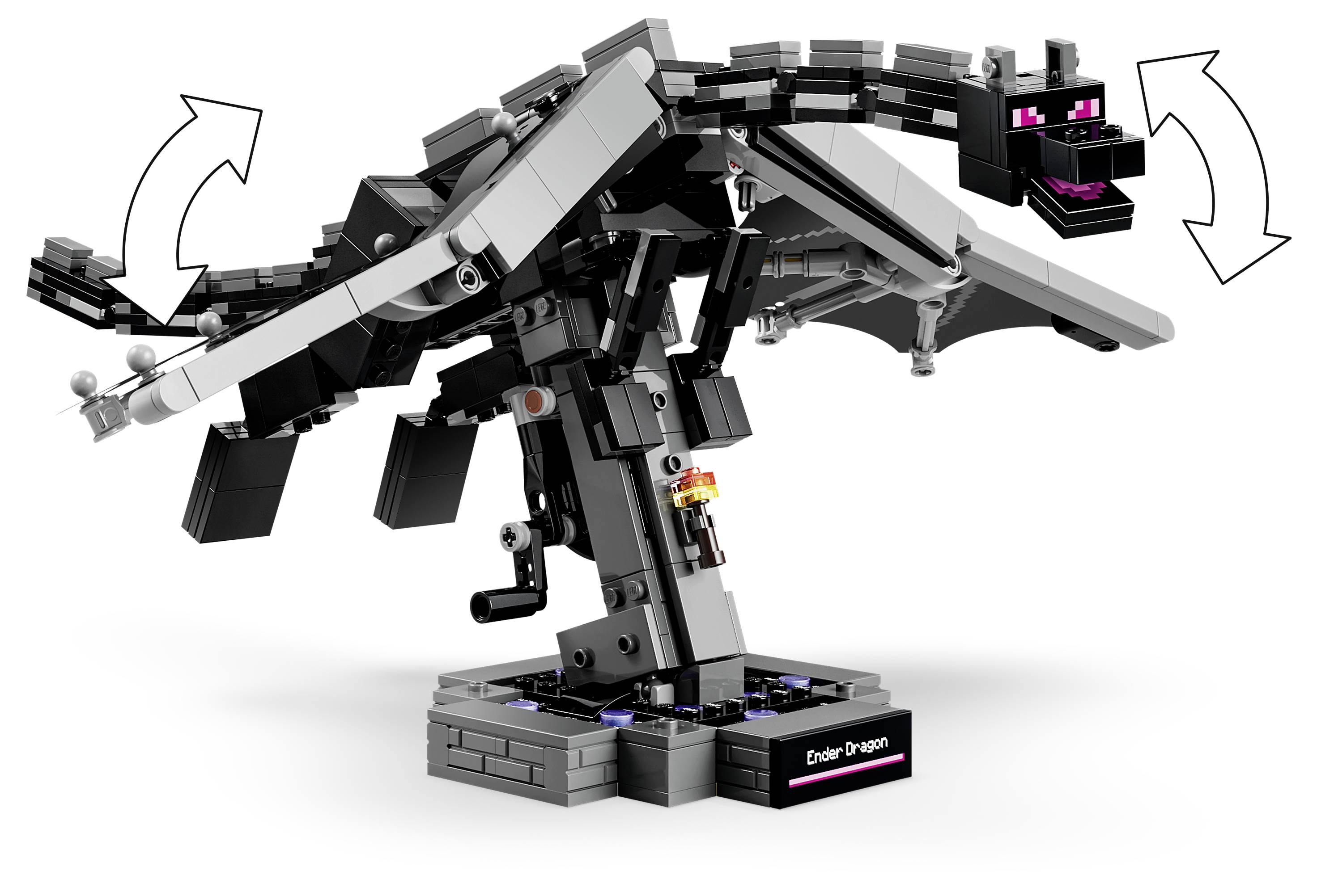 Lego-ähnliches schwarz-graues Drachenmodell auf einem Sockel, mit beweglichen Flügeln, Schwanz und Kopf, gezeigt mit Pfeilen, die die Gelenkigkeit andeuten.