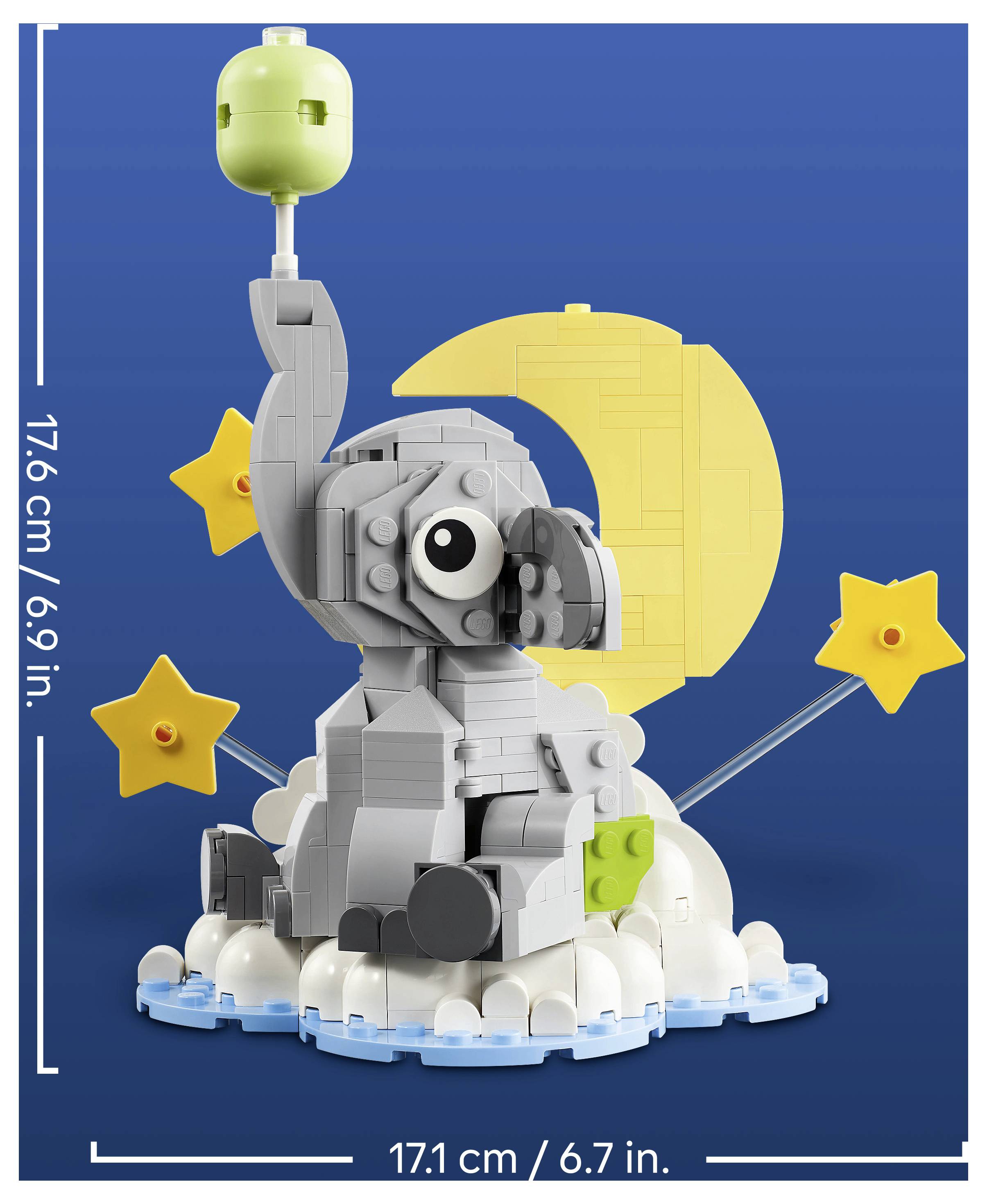 LEGO-ähnliches graues Elefantenmodell auf blauem Hintergrund, stehend auf einer wolkenähnlichen Basis mit großem gelbem Mond und Sternen dahinter; Abmessungen angezeigt: 17,6 cm und 17,1 cm.