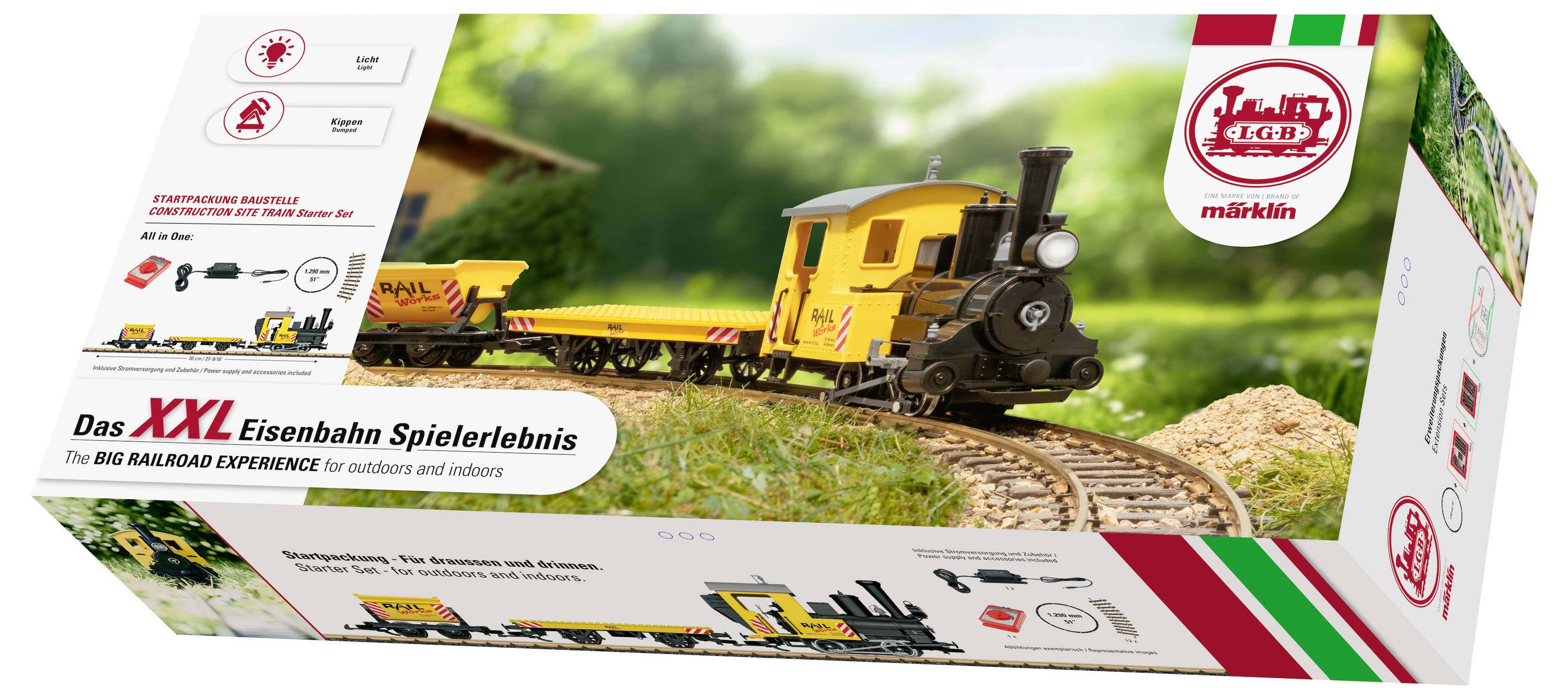 Schachtel eines Märklin-Spielzeugeisenbahn-Sets mit einer gelben Lokomotive und Waggons auf gebogener Strecke im Freien, beschriftet mit „Das XXL Eisenbahn Spielerlebnis