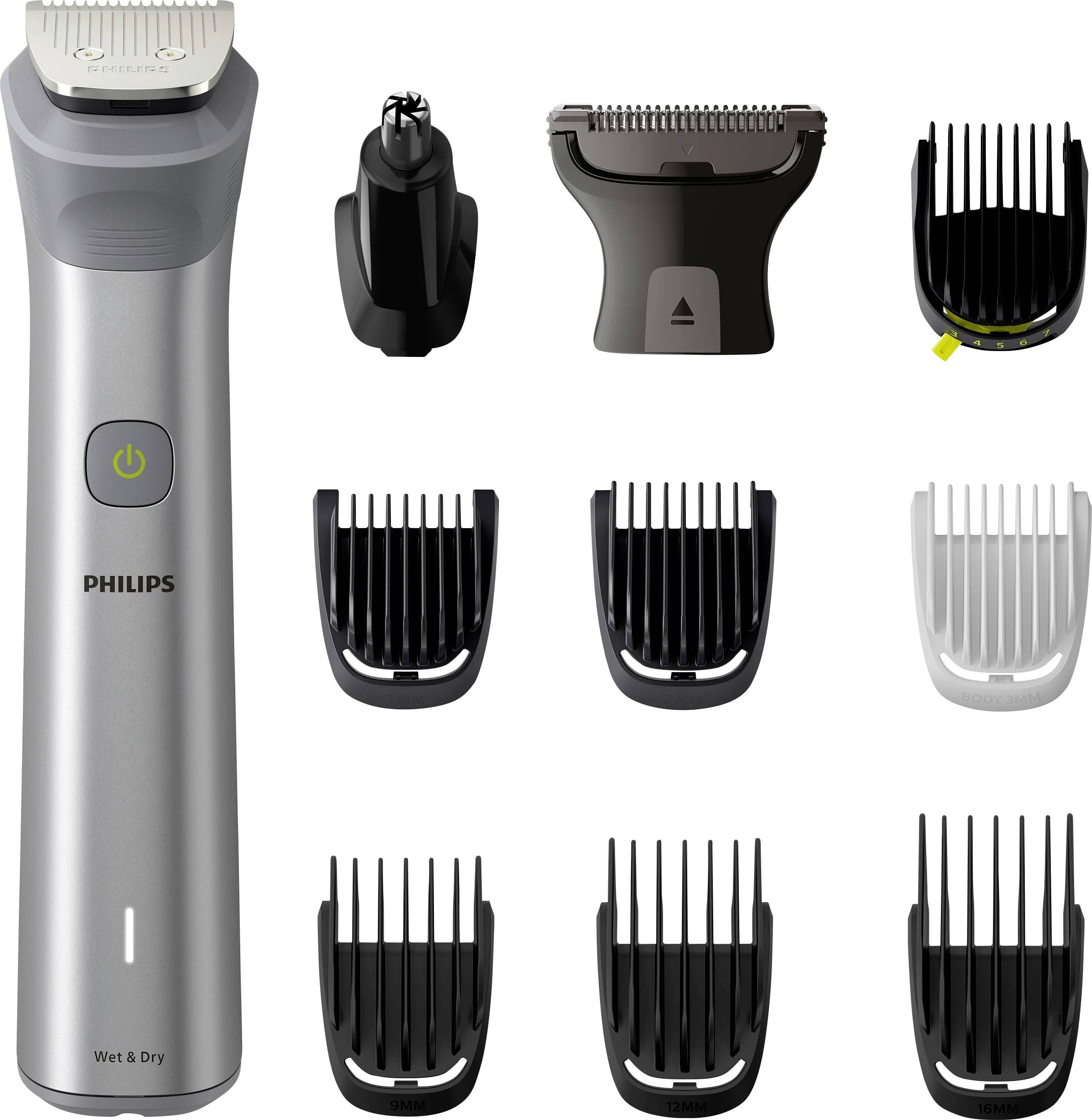Philips Wet & Dry Trimmer mit mehreren abnehmbaren Kammaufsätzen und einem Reinigungszubehör auf weißem Hintergrund.