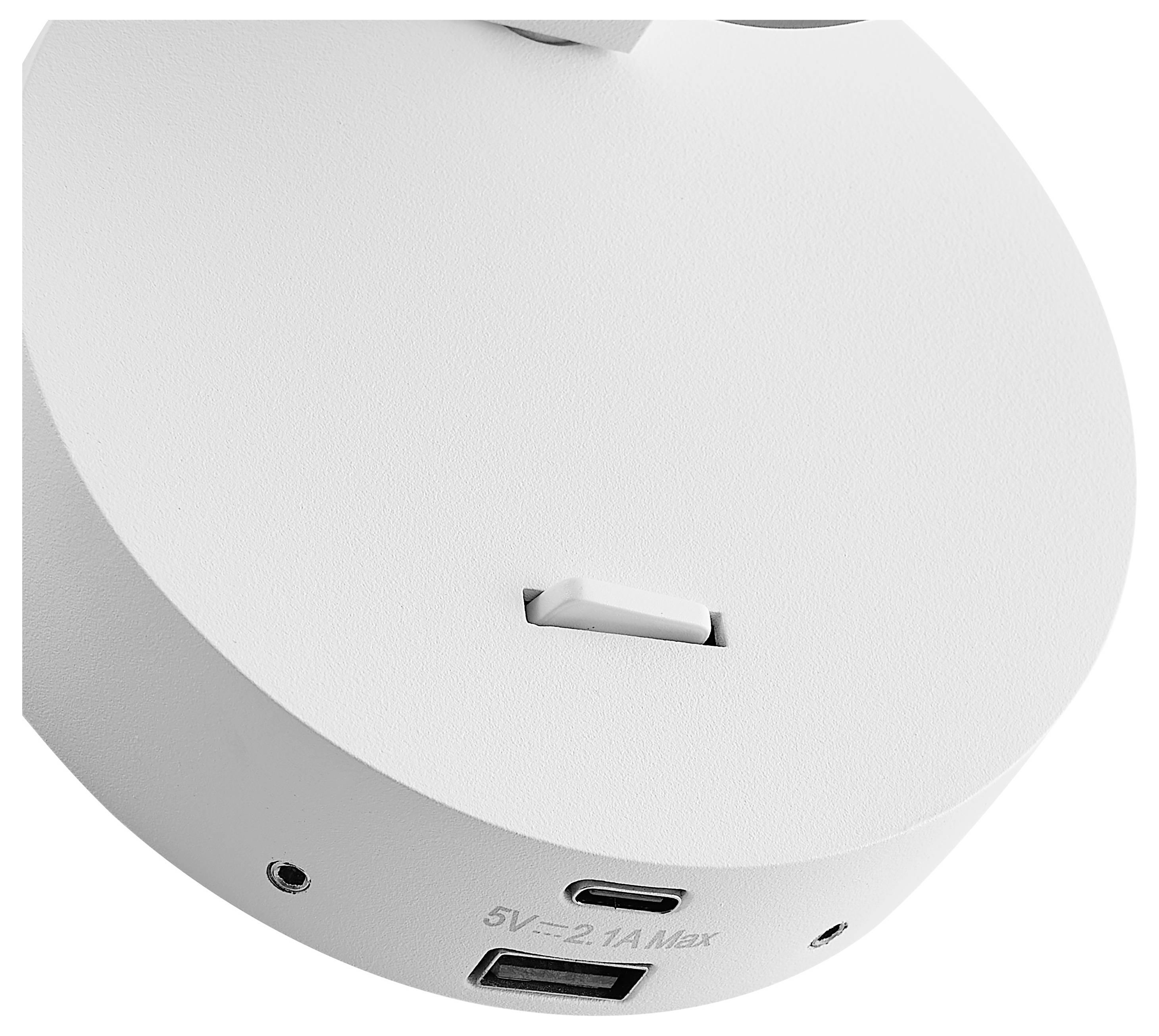 Nahaufnahme eines weißen kreisförmigen elektronischen Geräts mit USB-C-Anschluss, USB-A-Anschluss und Beschriftung 5V=2,1A Max.