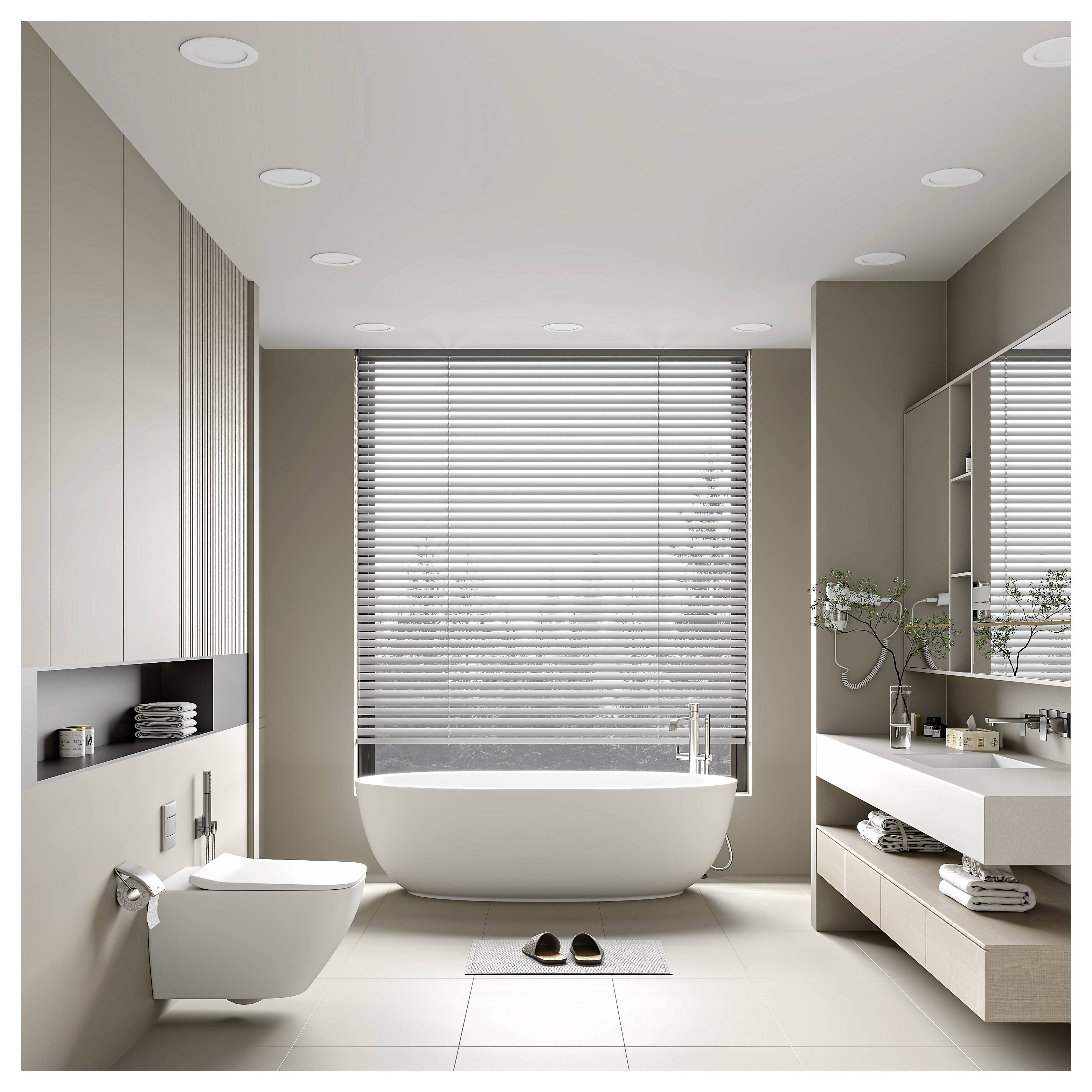 Modernes minimalistisches Badezimmer mit freistehender Badewanne unter einem Fenster, an der Wand montierter Toilette, Waschbecken und gefalteten Handtüchern; ein Paar Hausschuhe sitzt auf dem Boden.