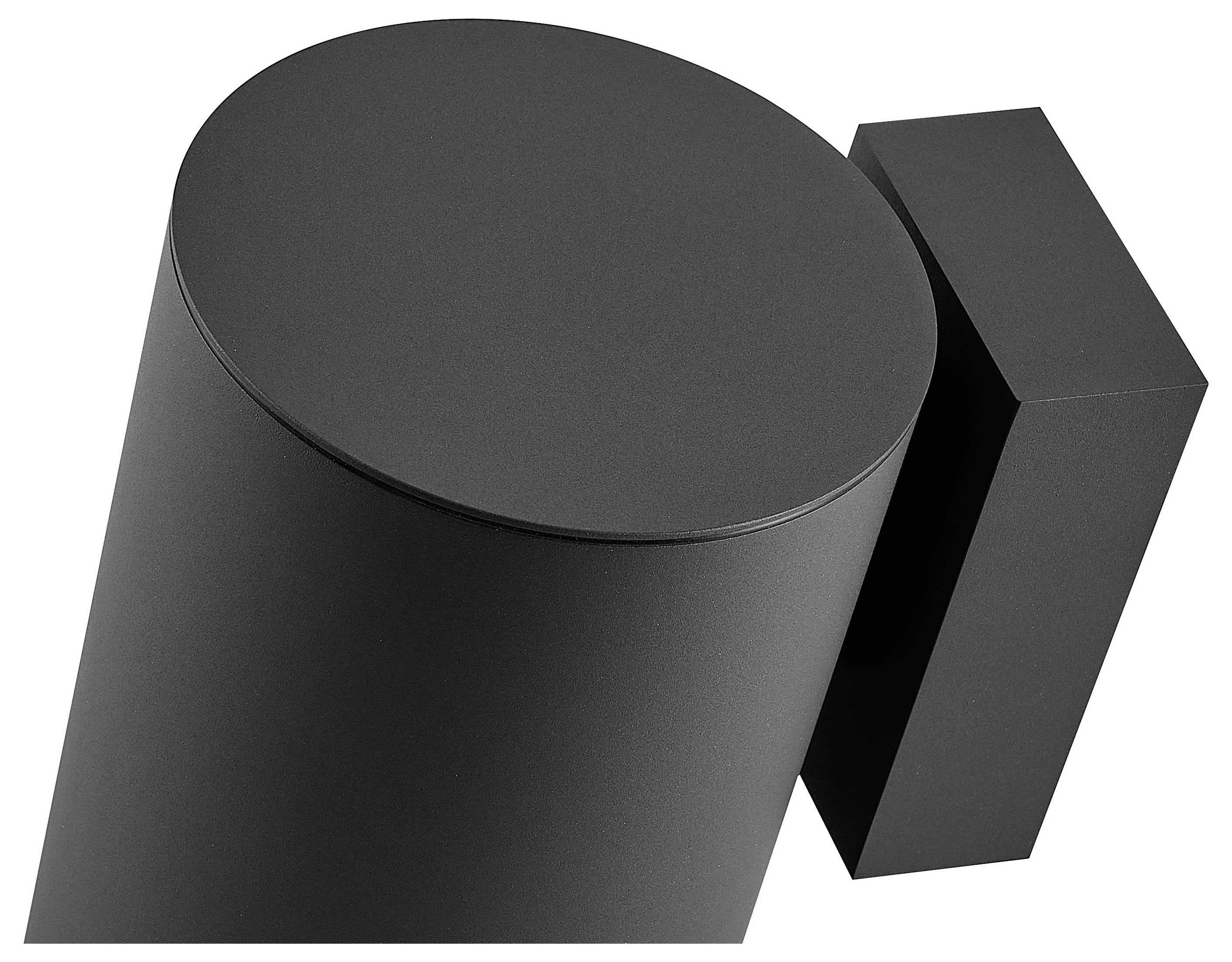 Schwarzes 3D-Geometrisches Symbol: ein geneigter Zylinder neben einem rechteckigen Block auf weißem Hintergrund.