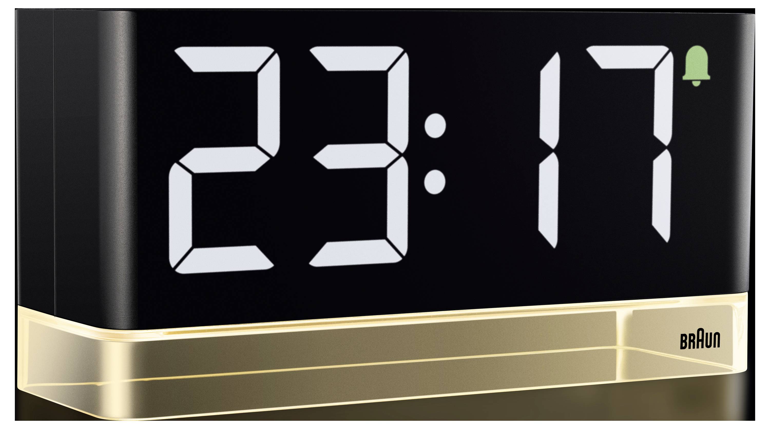 Digitale Braun-Uhr, die 23:17 anzeigt, mit einem kleinen grünen Glockensymbol, das angibt, dass ein Wecker gestellt ist.