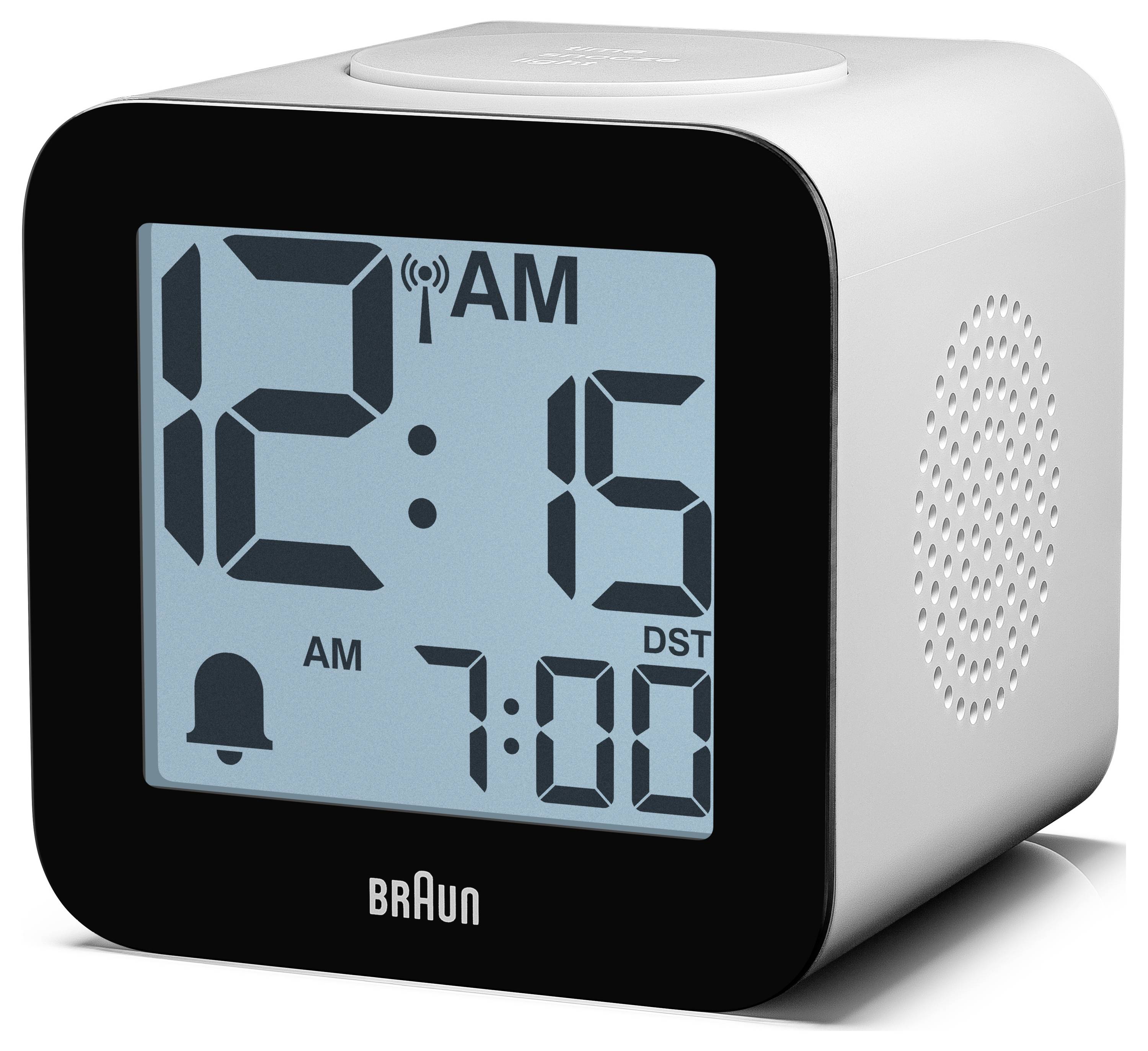 Braun digitale Wecker zeigt 12:15 Uhr morgens und 7:00 Uhr Alarm mit Sommerzeit-Indikator und Glockensymbol.