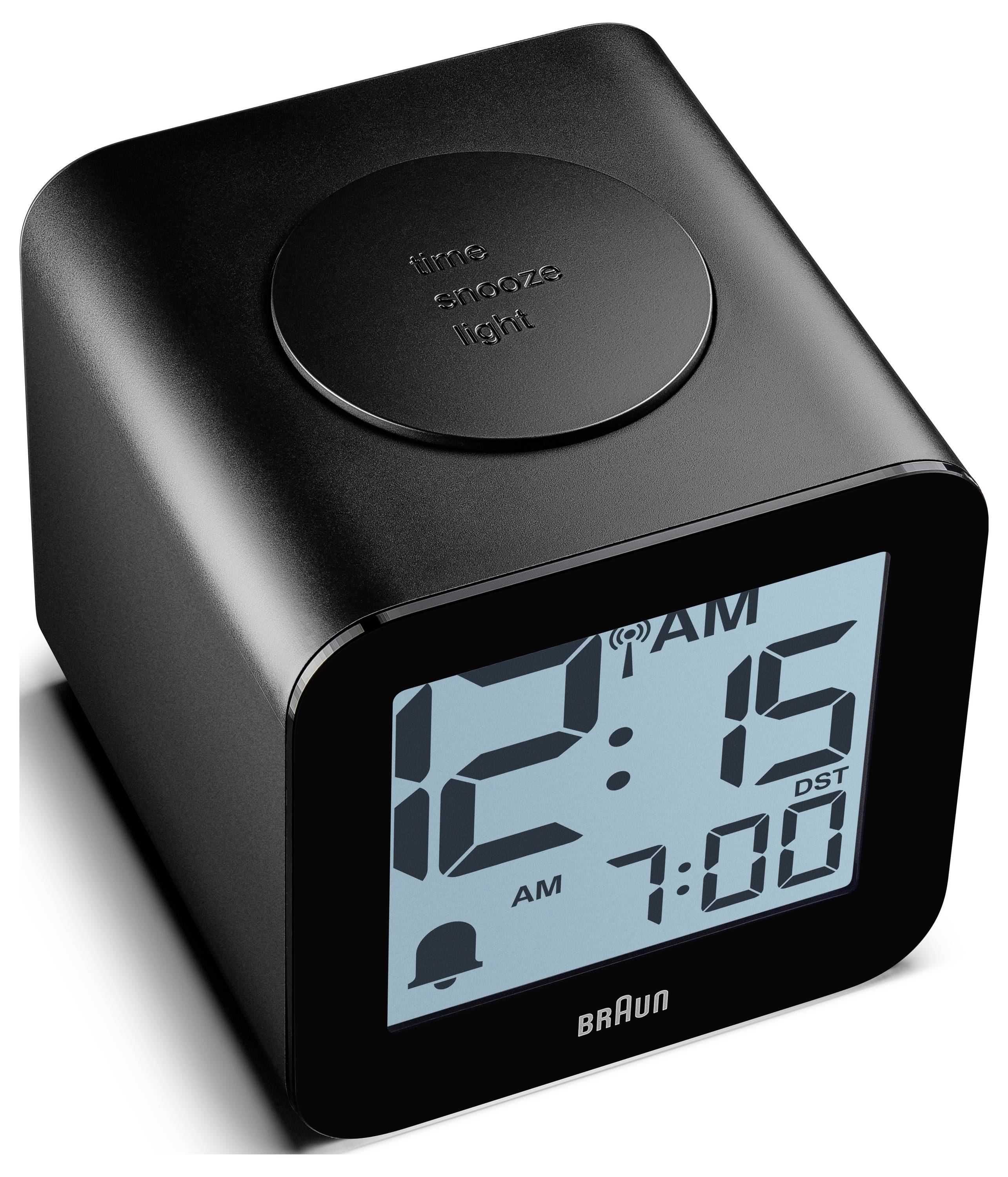 Schwarze Braun-Digitalwecker zeigt 12:15 Uhr morgens an, mit Wecker auf 7:00 Uhr eingestellt, und eine obere Schlummern-/Lichttaste.
