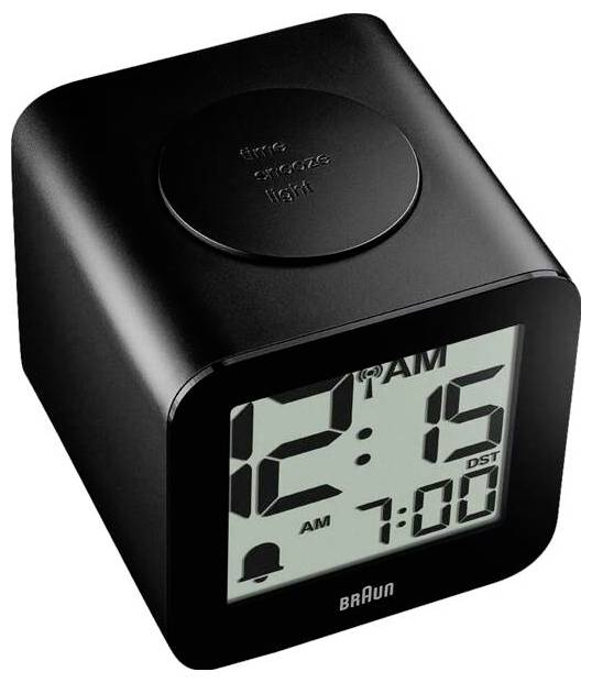 Schwarze Braun-Digitalwecker zeigt 12:15 Uhr morgens mit einem 7:00-Uhr-Weckeranzeiger und Schlummern-/Lichttaste oben.