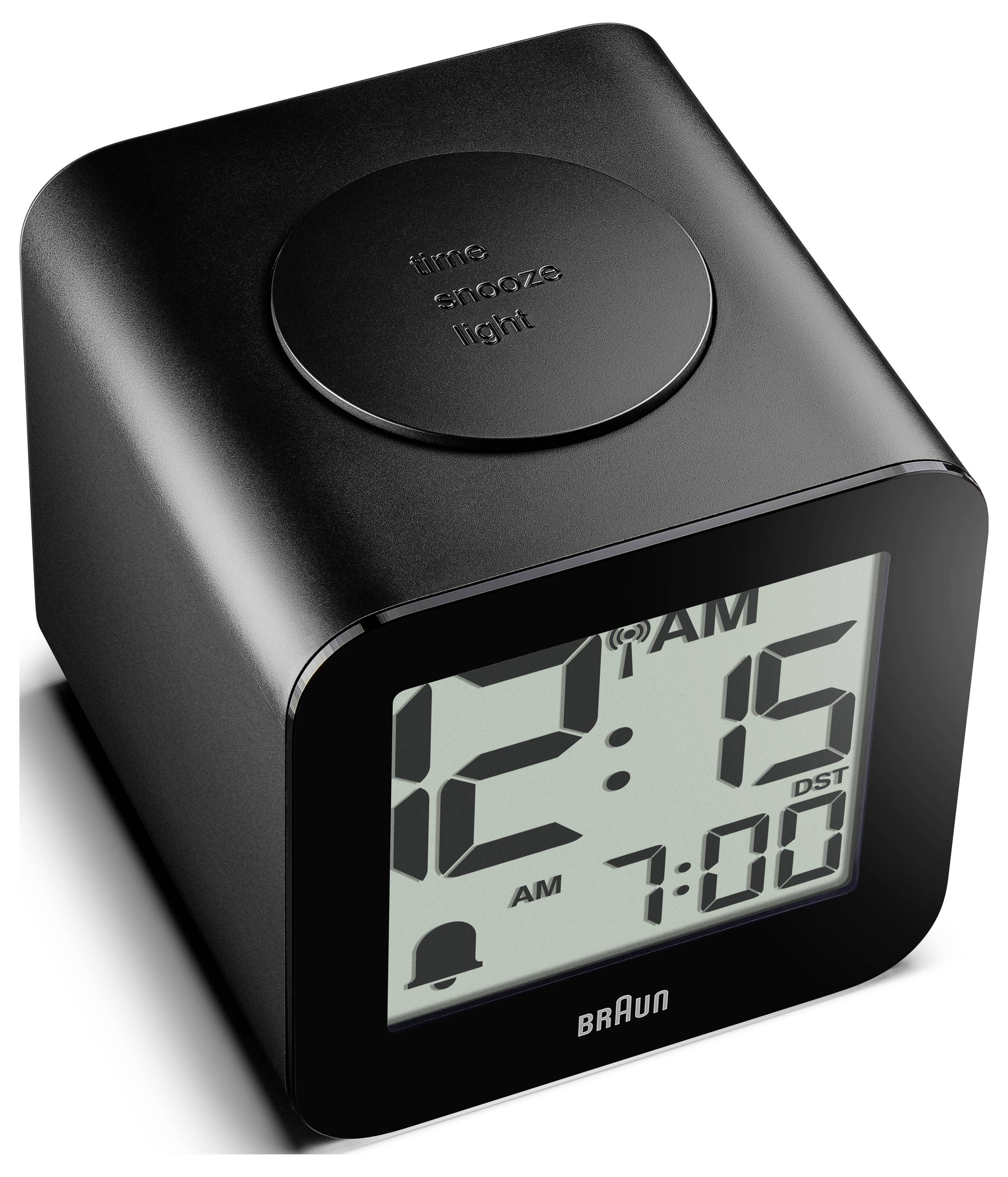 Schwarze Braun Digitalwecker, die 12:15 Uhr morgens anzeigt, mit Alarm auf 7:00 Uhr eingestellt und Sommerzeit-Anzeige; runder oberer Schlummertaste.