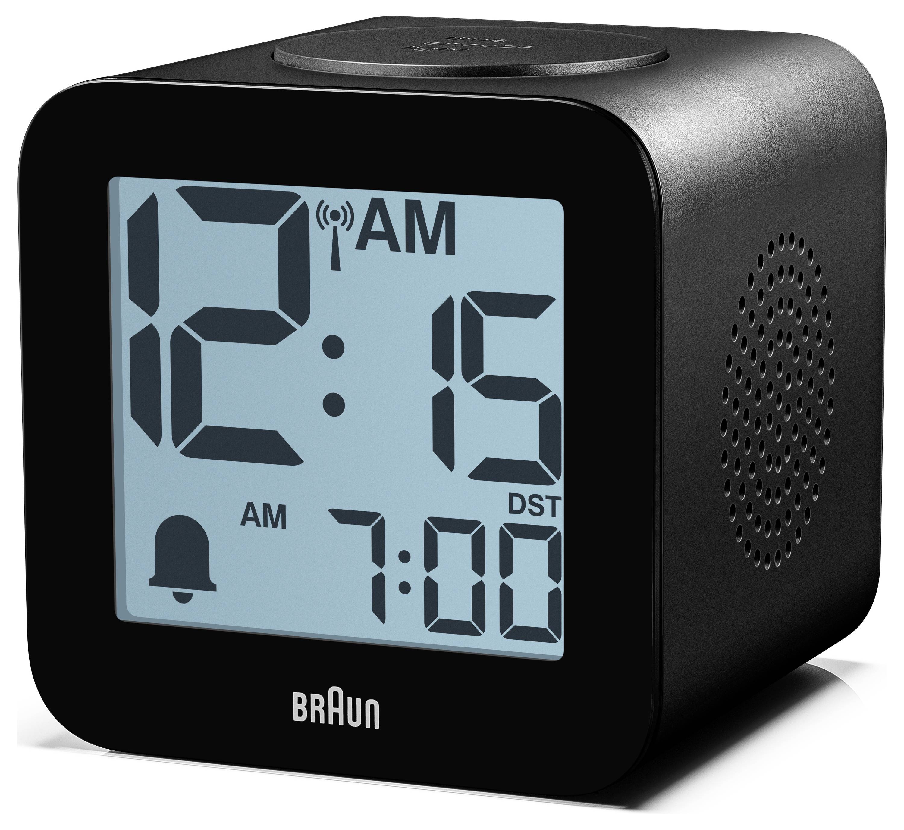 Schwarz-braun digitaler Wecker zeigt 12:15 Uhr mit Funksignalsymbol, Alarmsymbol, Sommerzeit und 7:00 Uhr Alarmeinstellung.