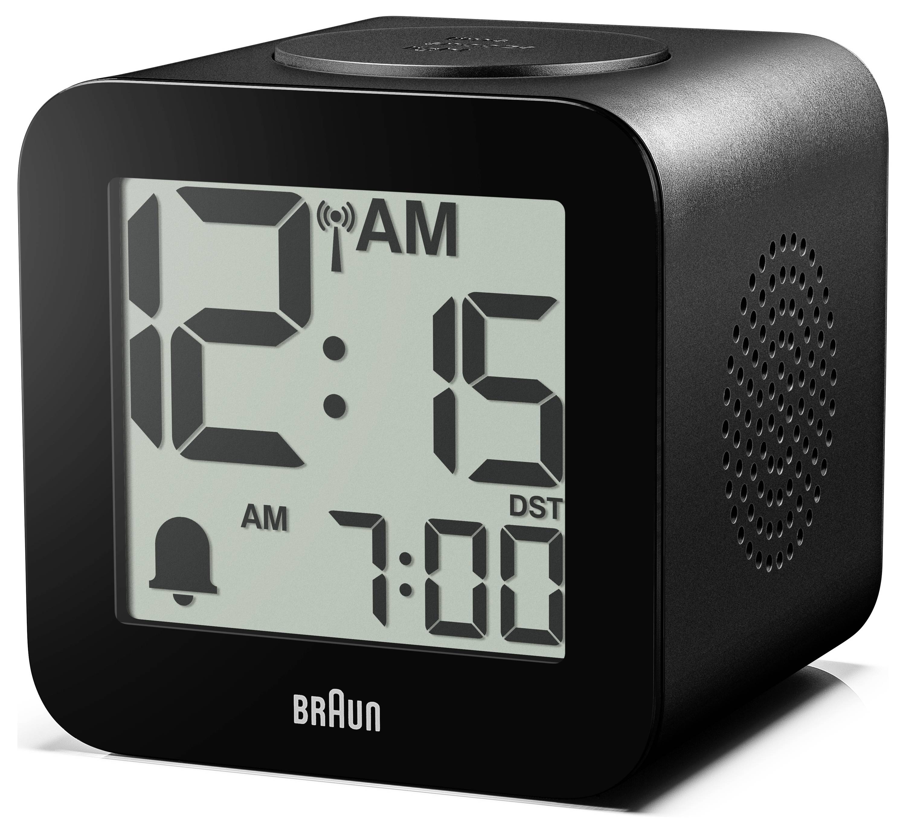 Schwarze Braun Digitalwecker zeigt 12:15 Uhr morgens an, mit Alarm- und Sommerzeit-Anzeigen und einer 7:00 Uhr-Einstellung auf dem Display.