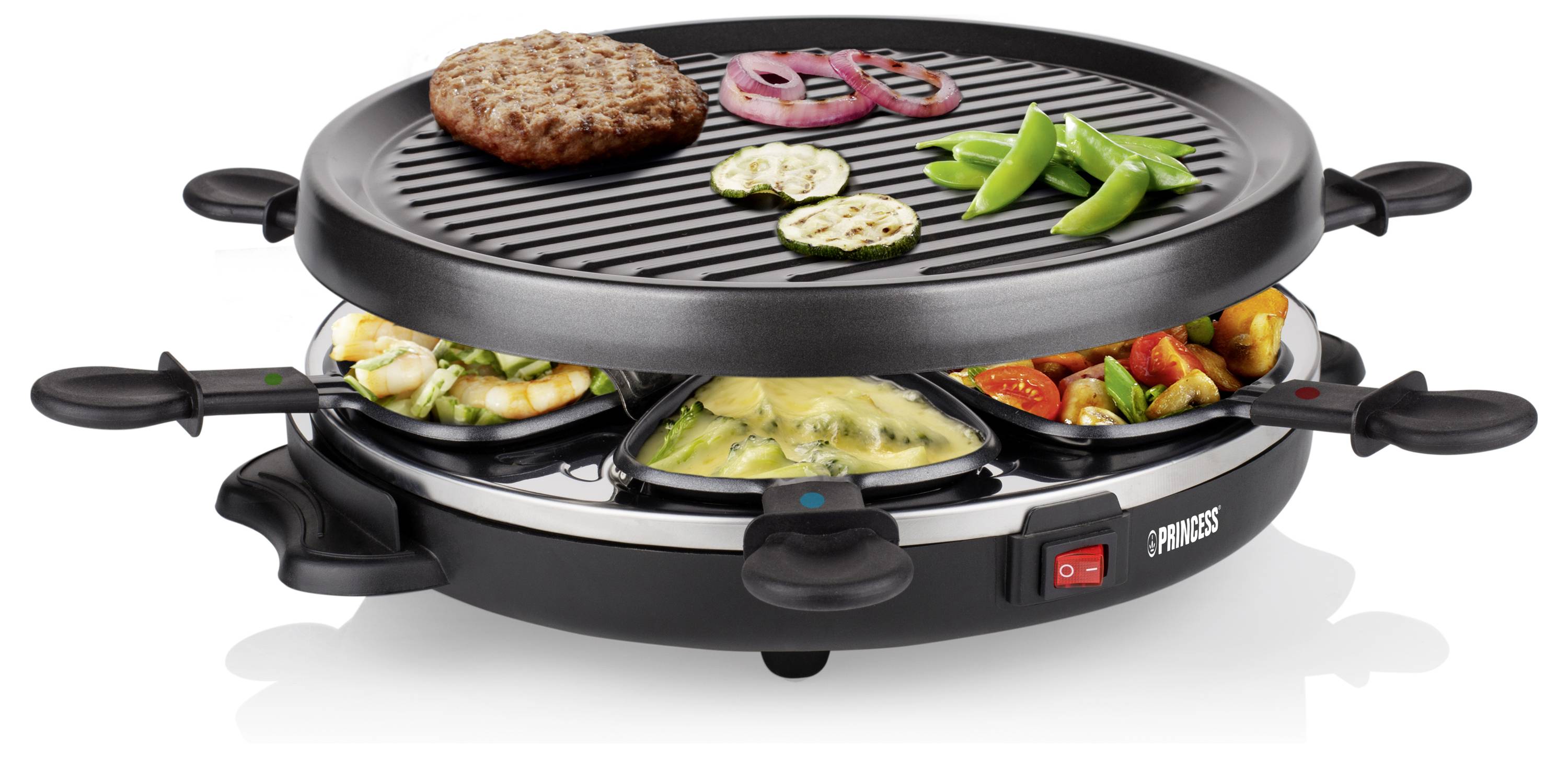 Schwarzer elektrischer Tischgrill und Raclette-Set mit rundem Grillplatte oben und vier gefüllten Pfannen darunter, auf dem Burgerpattys, Gemüse und geschmolzener Käse zubereitet werden.