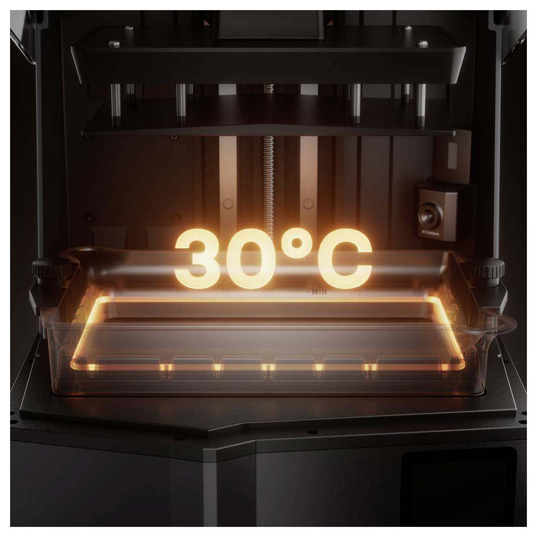 3D-Druckerbett wird auf 30°C aufgeheizt, angezeigt durch leuchtendes orangefarbenes Temperatur-Display über der Druckplattform.