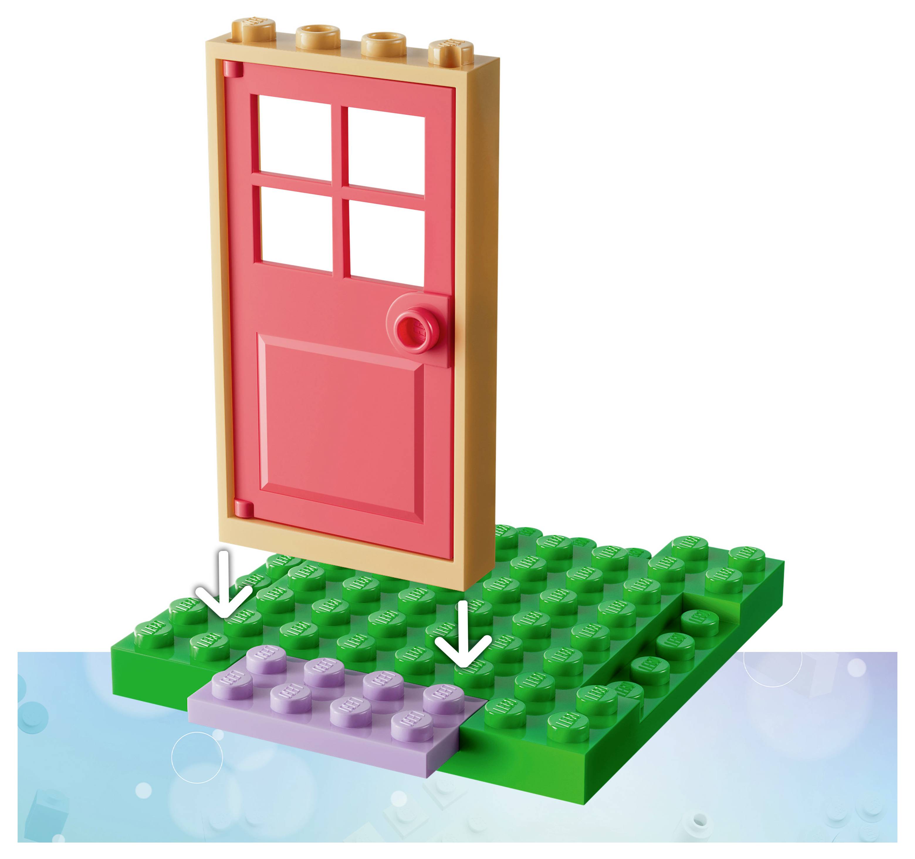 Rote Tür auf einer grünen LEGO-ähnlichen Basis montiert, mit einer kleineren violetten Platte und nach unten zeigenden Pfeilen, die die Platzierung oder Montage anzeigen.