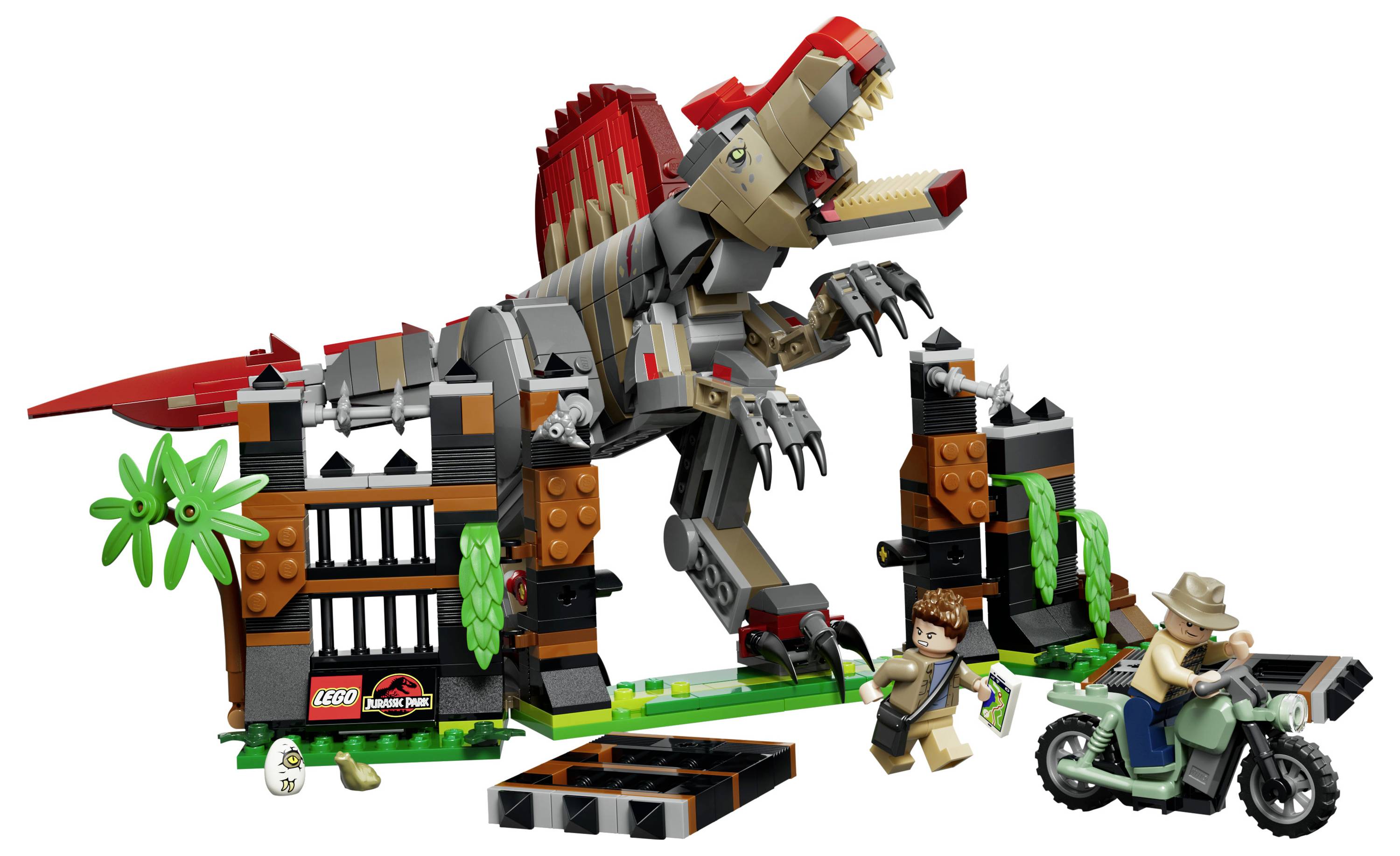 LEGO Jurassic World Szene mit einem brüllenden T-Rex, der durch ein Parktor bricht, während zwei Minifiguren zu Fuß und auf einem Motorrad fliehen.