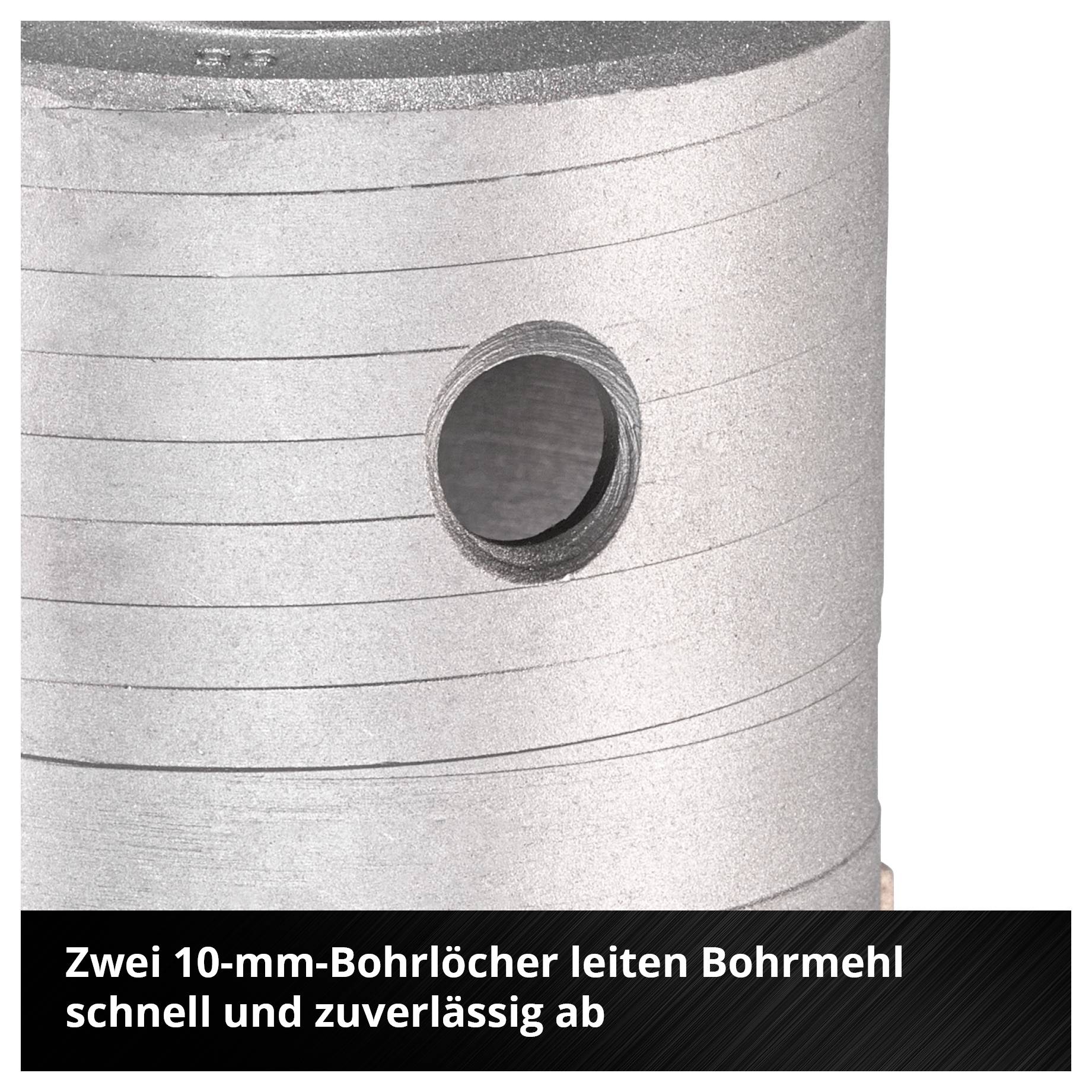 Nahaufnahme eines Metallzylinders mit Bohrloch; Text erklärt, dass zwei 10-mm-Bohrlöcher Bohrmehl schnell und zuverlässig ableiten.