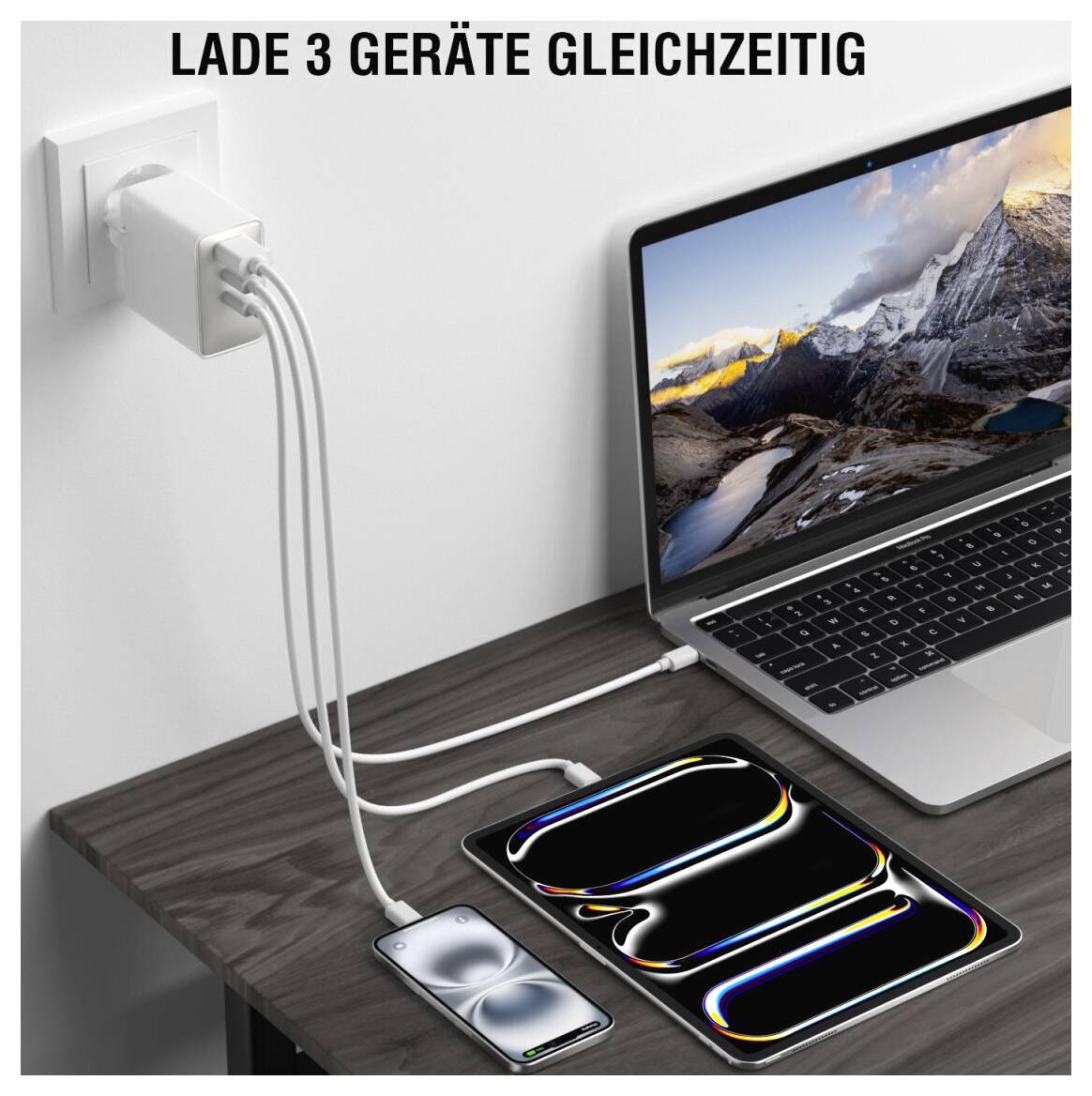 Wandladegerät lädt Laptop, Tablet und Smartphone gleichzeitig, mit dem Text „LADE 3 GERÄTE GLEICHZEITIG