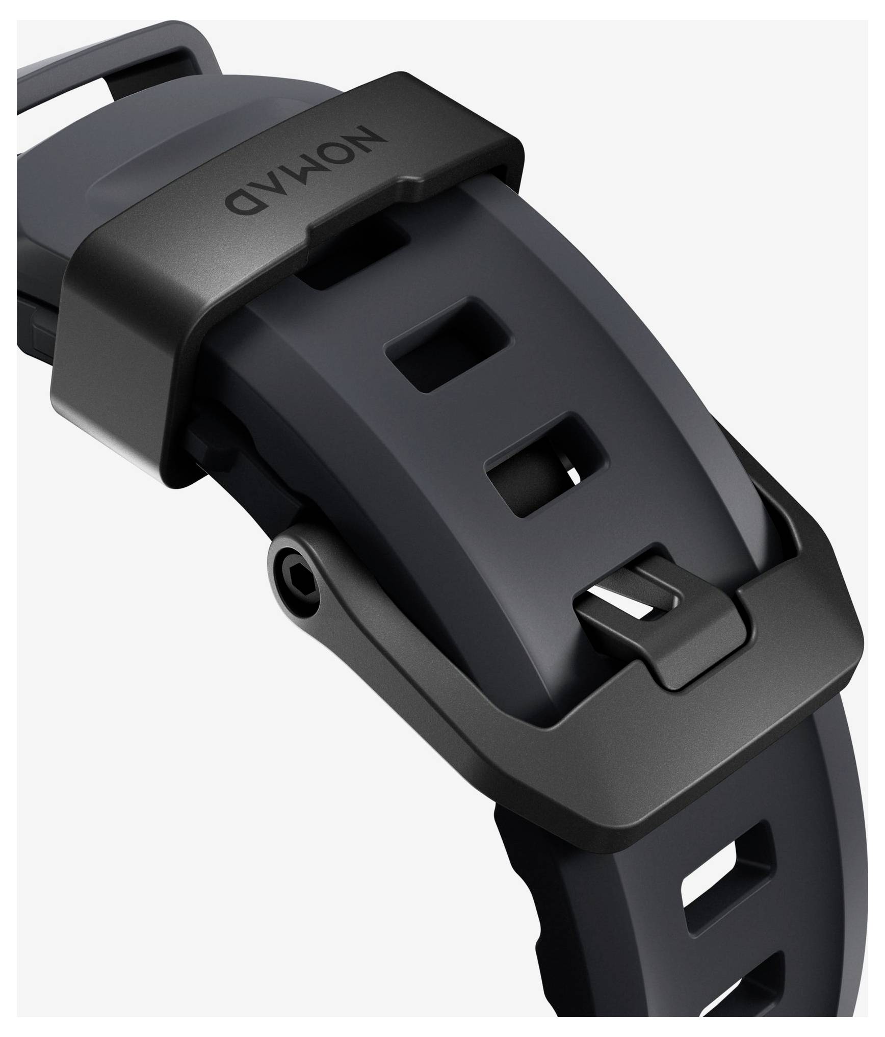 Nahaufnahme eines schwarzen Uhrenarmbands mit einer grauen Schließe, die die Schnalle und Verstelllöcher zeigt.