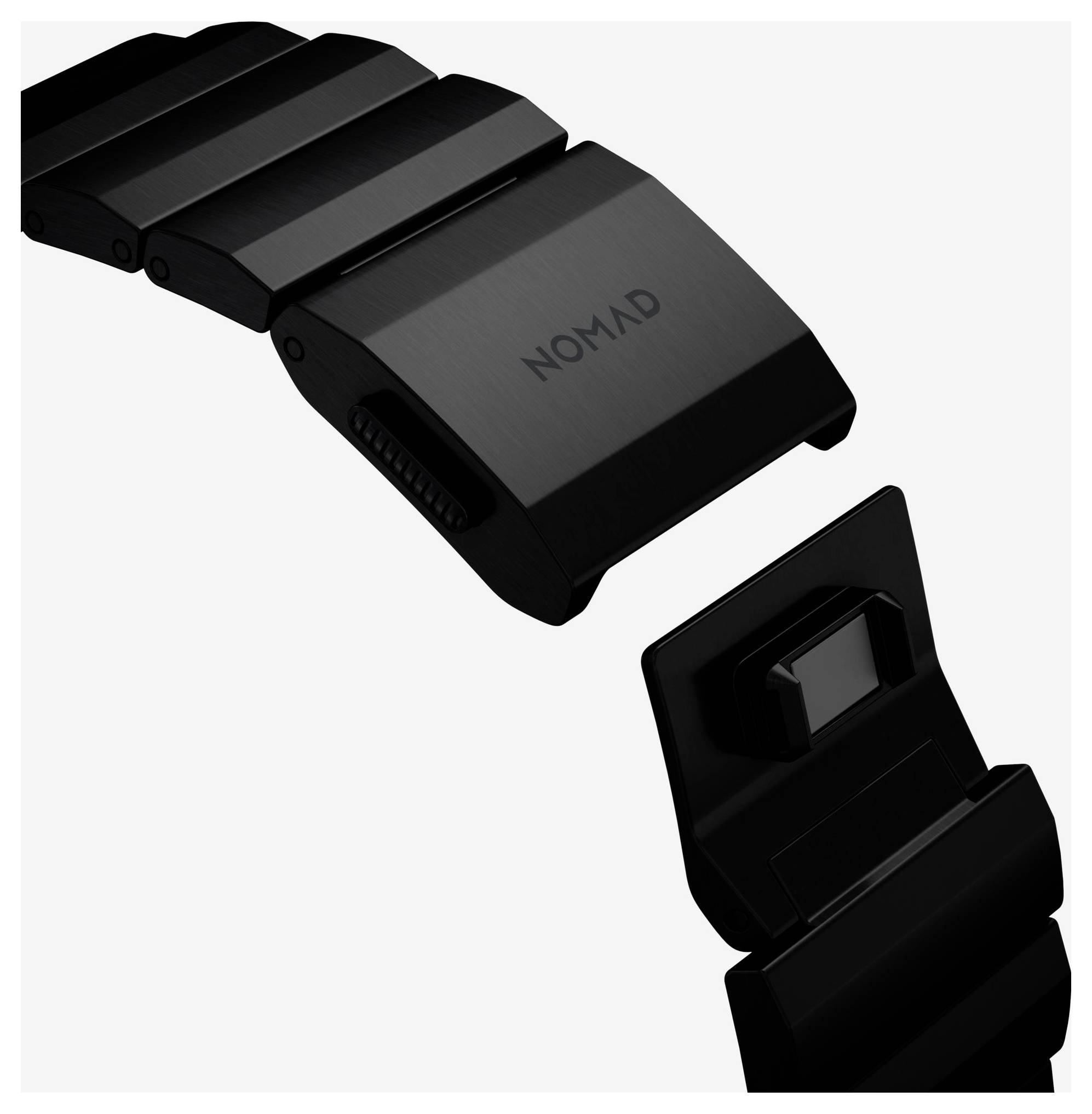 Schwarzes Nomad-Uhrenarmband mit Quick-Release-Connector, getrennt vom Armband dargestellt.