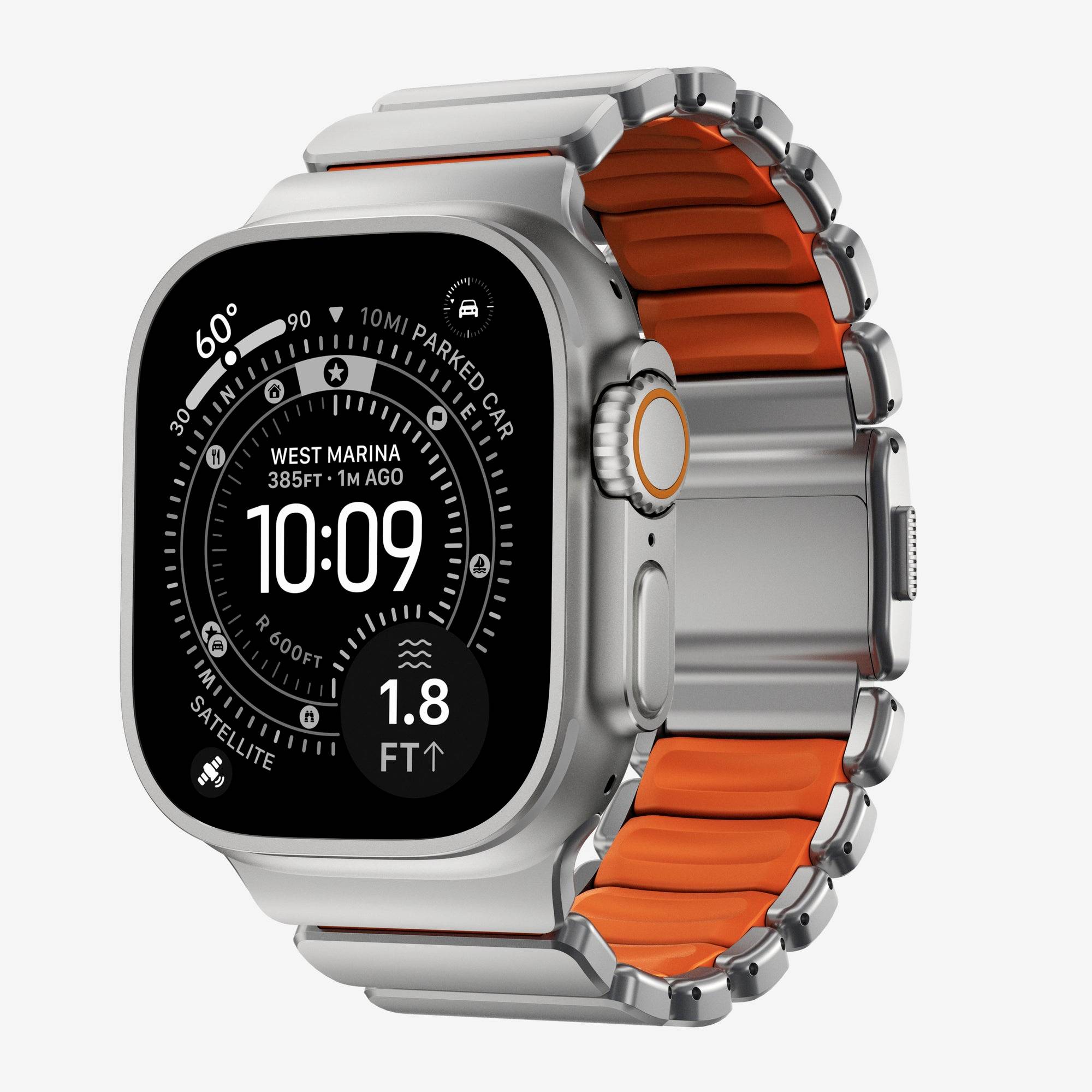 Apple Watch Ultra aus Silber mit orangefarbigem Armband, zeigt ein dunkles analog-inspiriertes Kompass-Zifferblatt und die Uhrzeit 10:09.