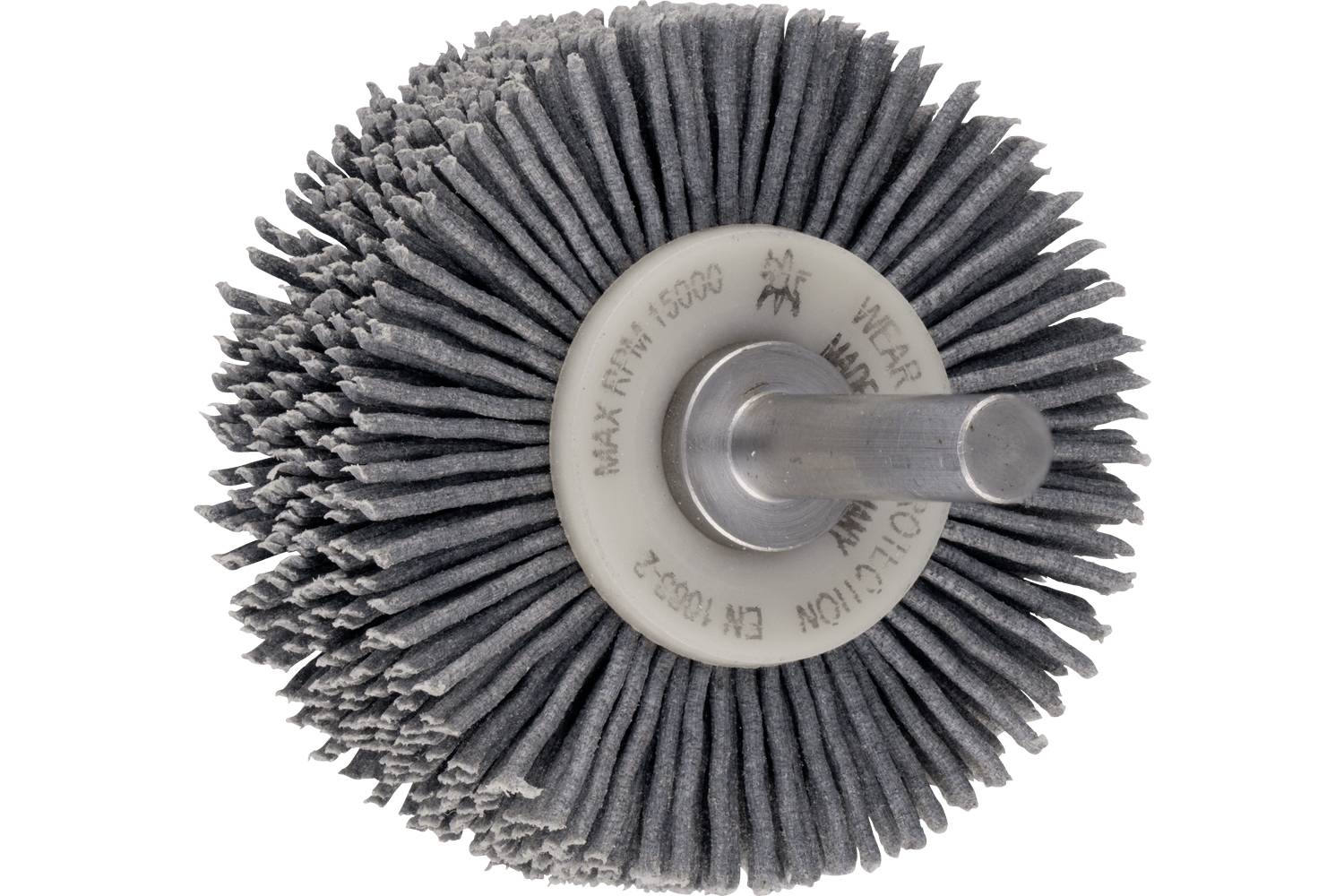 Close-up of a circular abrasive wheel brush with dense gray bristles and a metal center hub on a white background.