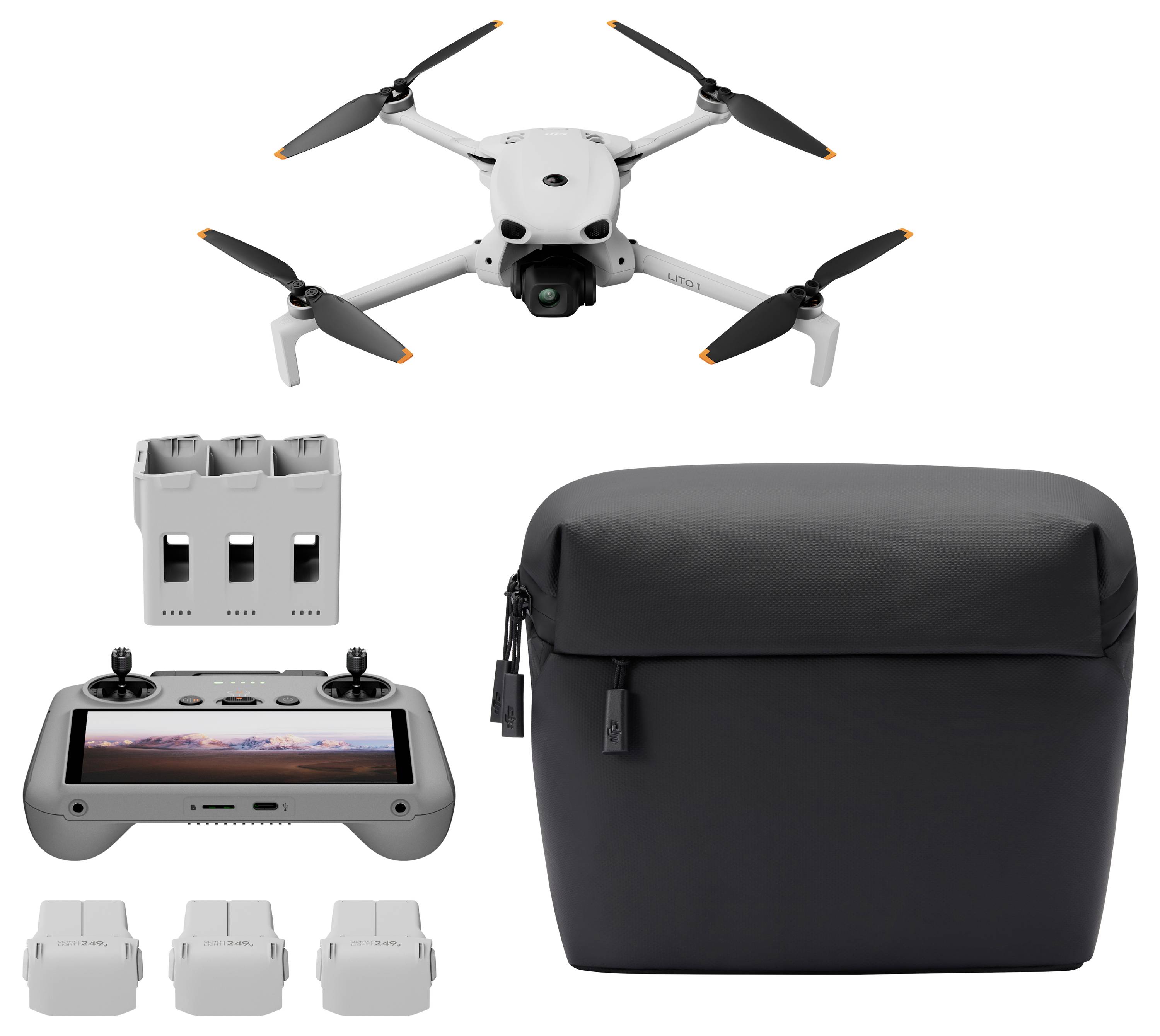 Drohnen-Set mit weißem Quadcopter, Fernbedienung, Zusatzakku, drei Batterieabdeckungen und schwarzer Transporttasche auf weißem Hintergrund.