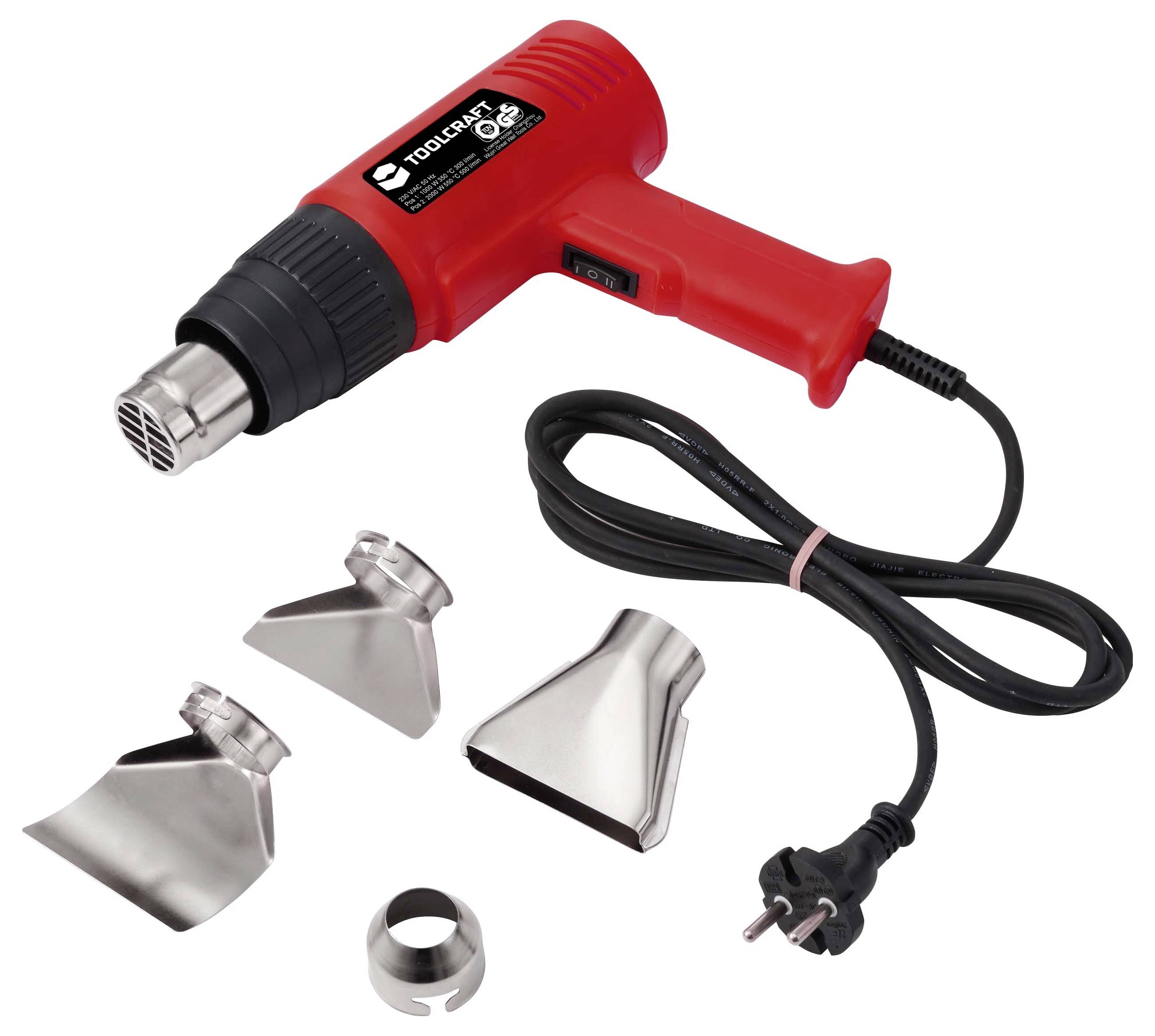Rotluftheizung mit Kabel und vier Metallaufsätzen auf weißem Untergrund.