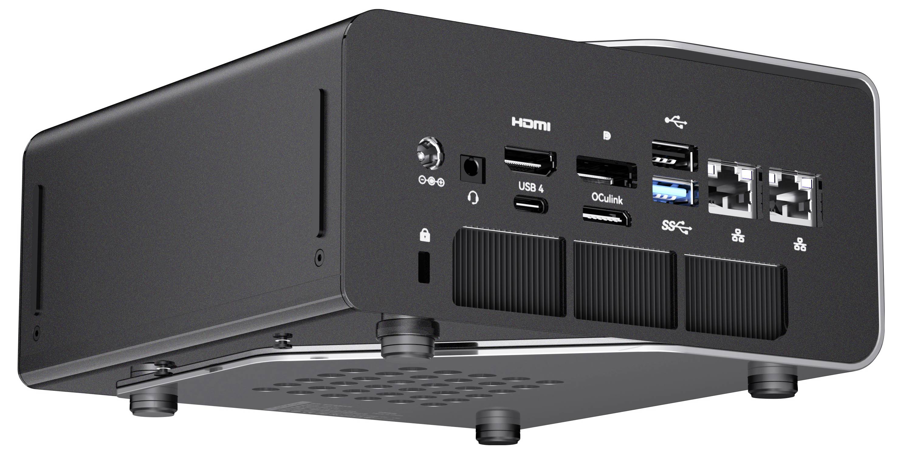Schwarzer kompakter Beamer von unten gezeigt, mit HDMI-, USB-, Audio- und Netzwerkports auf der Rückseite.