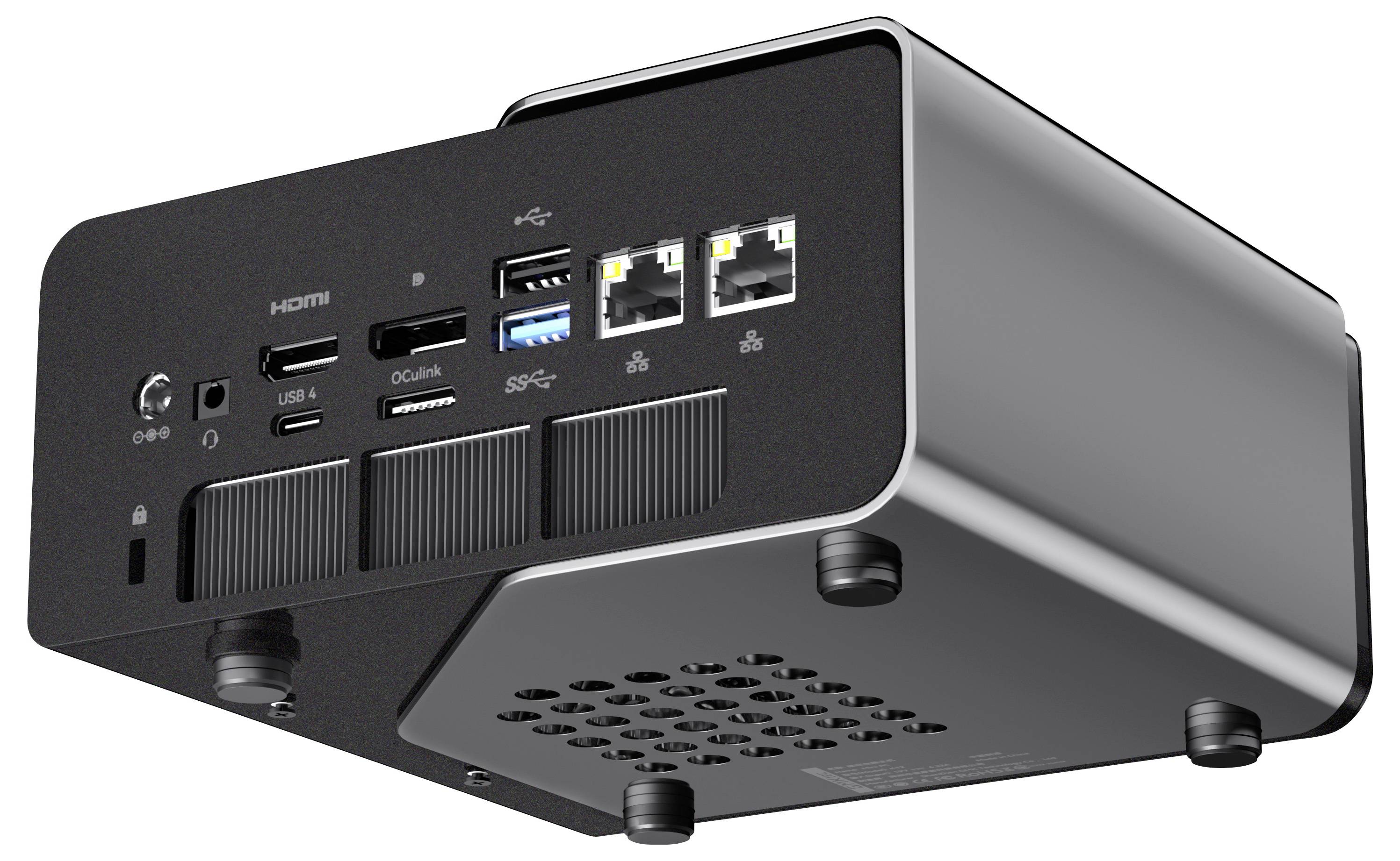 Kompakter schwarzer Mini-PC von unten gezeigt, mit HDMI-, USB-, Audio- und Ethernet-Anschlüssen auf der Rückseite.