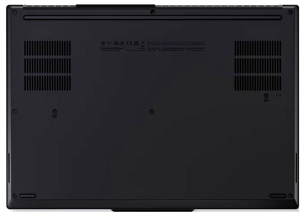 Unteransicht eines geschlossenen schwarzen Laptops mit Lüftungsgittern, Schrauben und Gummifüßen.