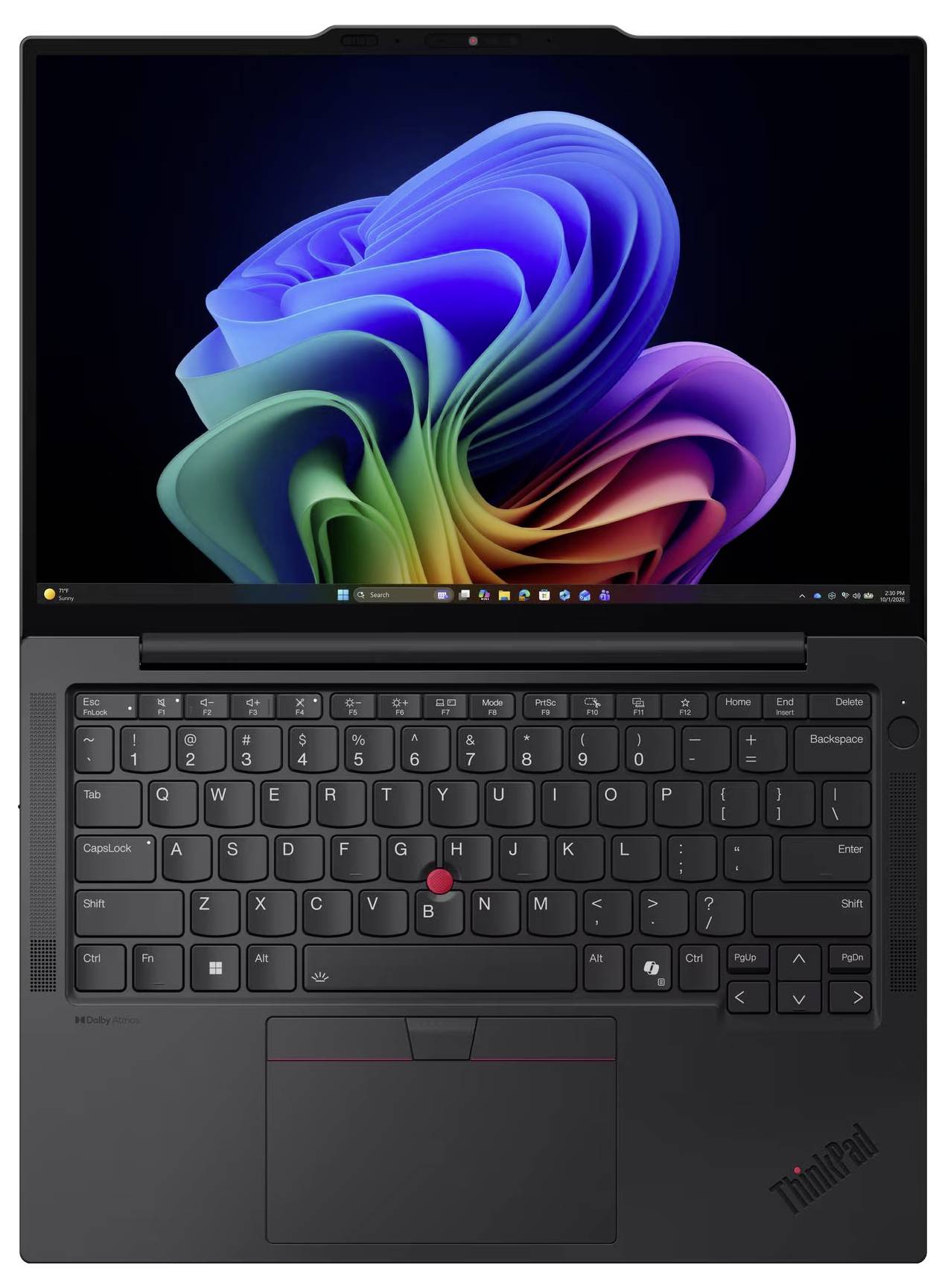 Schwarzer ThinkPad-Laptop mit Windows 11-Hintergrundbild auf dem Bildschirm, Tastatur und großes Touchpad sichtbar.