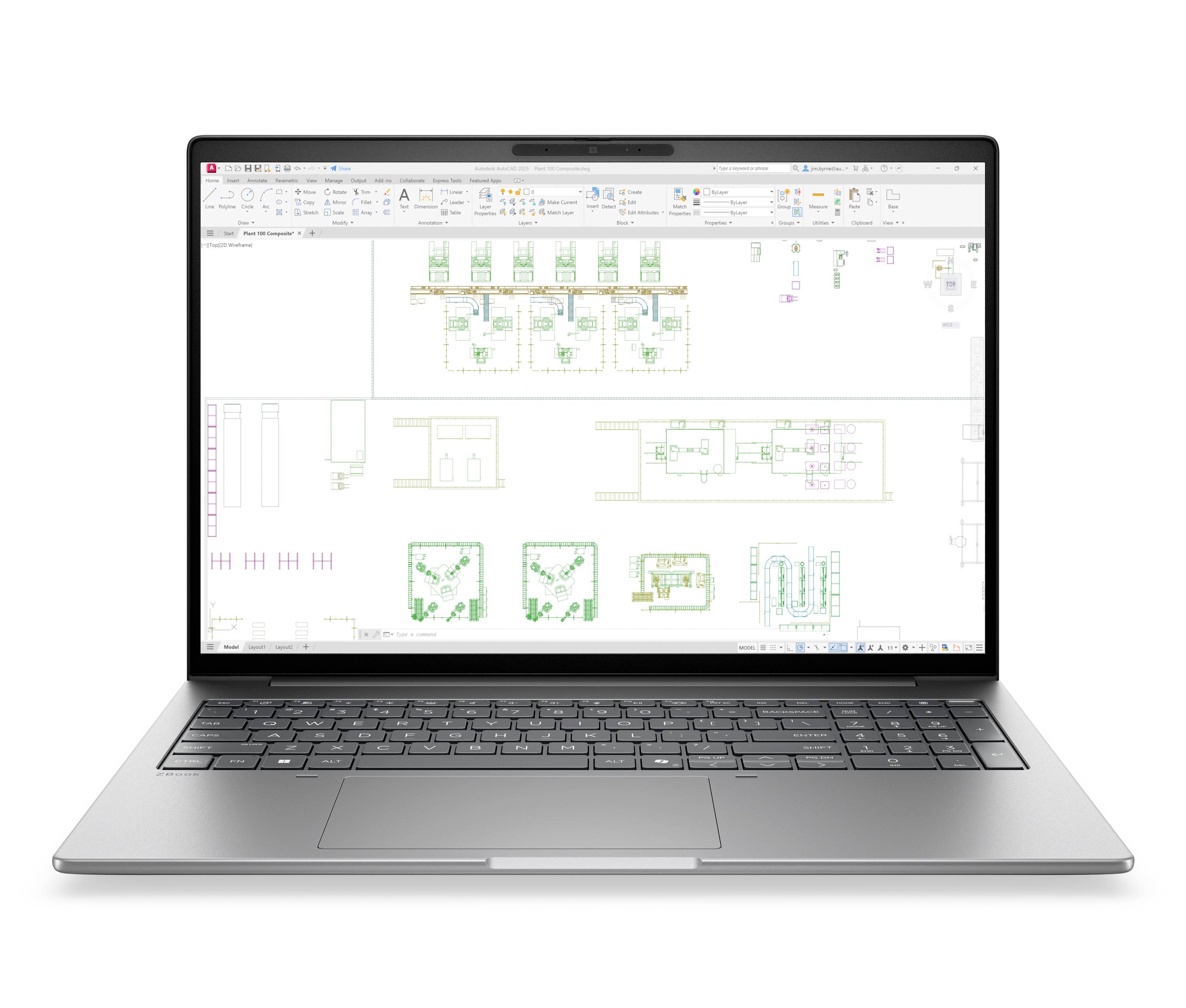 Laptop zeigt einen detaillierten technischen Grundriss oder ein Schaltschema in Designsoftware auf einem weißen Bildschirm